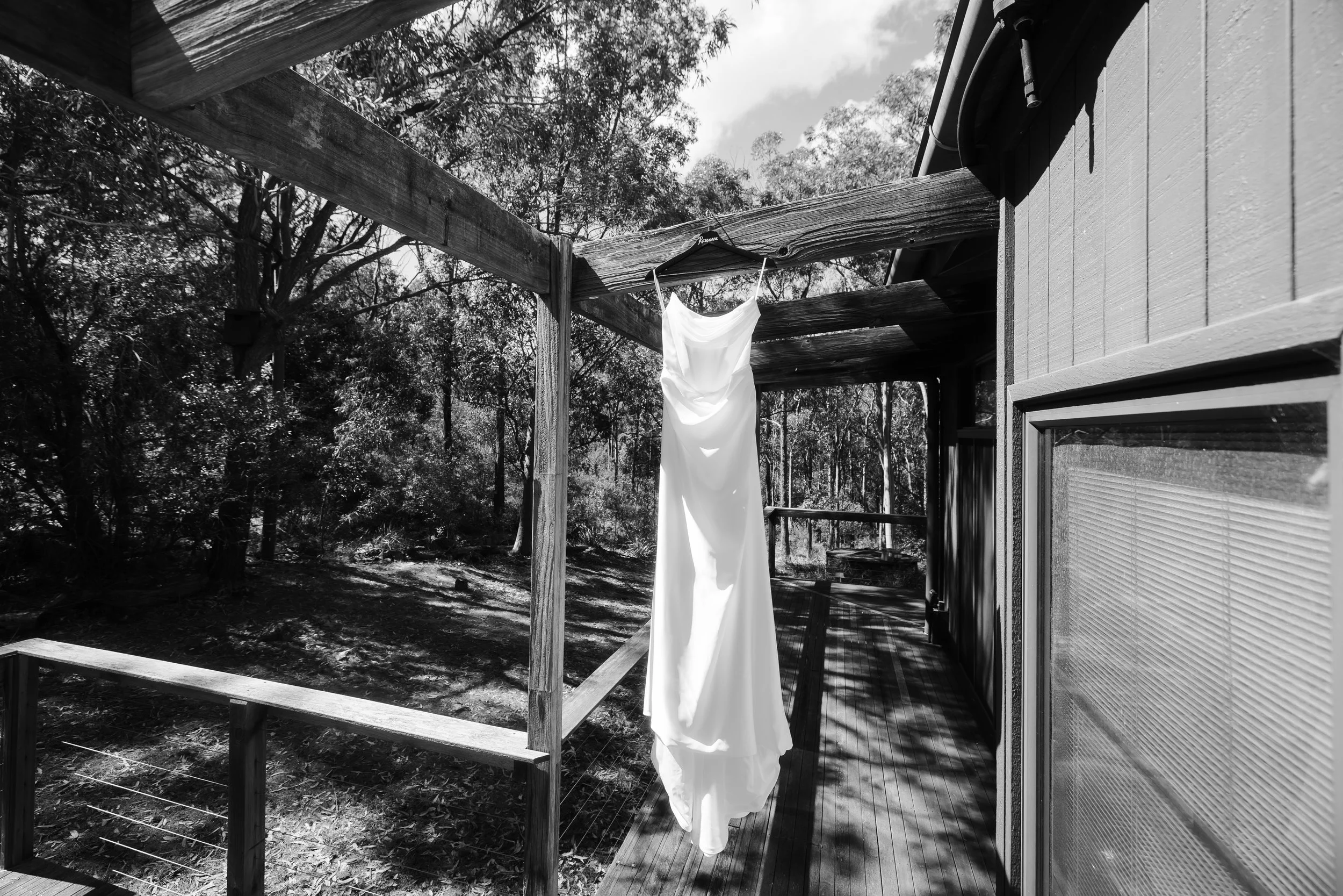 wedding dress hanging in black and white