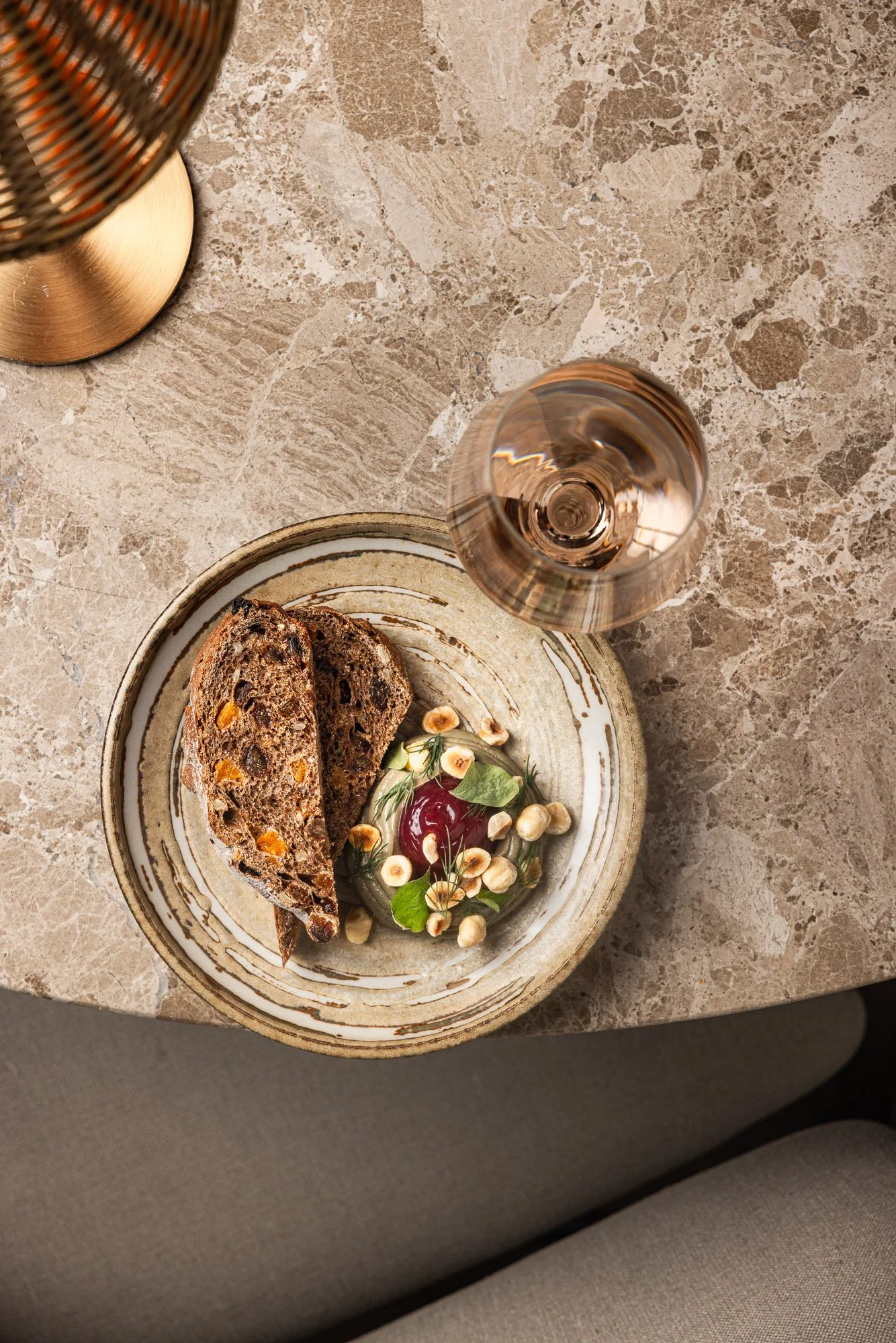 Commercial food photography, overhead starter with bread, hazelnuts and herb cream for menus and social, shot in Bournemouth, Dorset, venue marketing in Truro, Cornwall, for use in London and Swindon, Wiltshire.