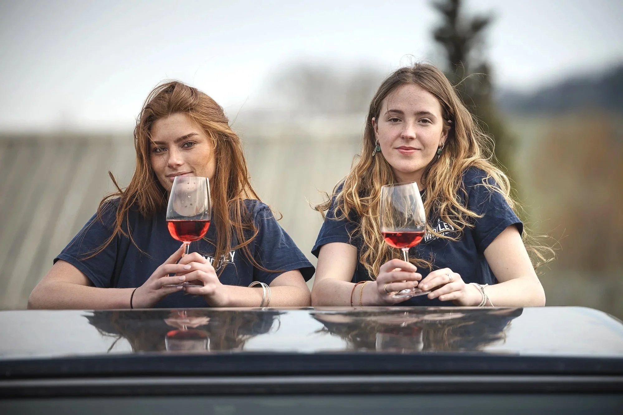 Two women enjoying glasses of rosé at Kenton Park Estate near Exeter, photographed for Devon hospitality, visitor experience and drinks marketing. The Mole Re