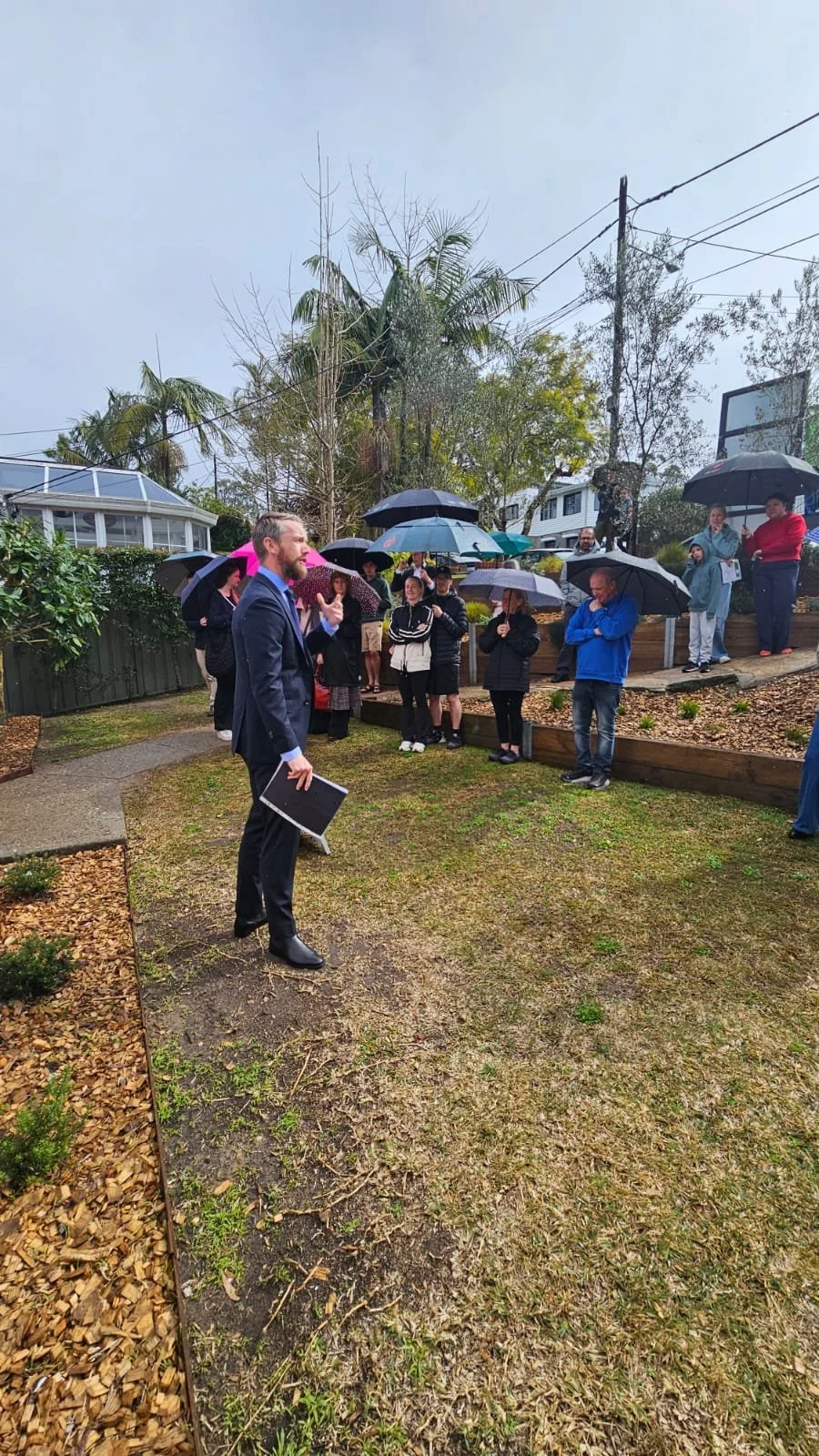 Secretly Buying the House Next Door (and Winning at Auction)