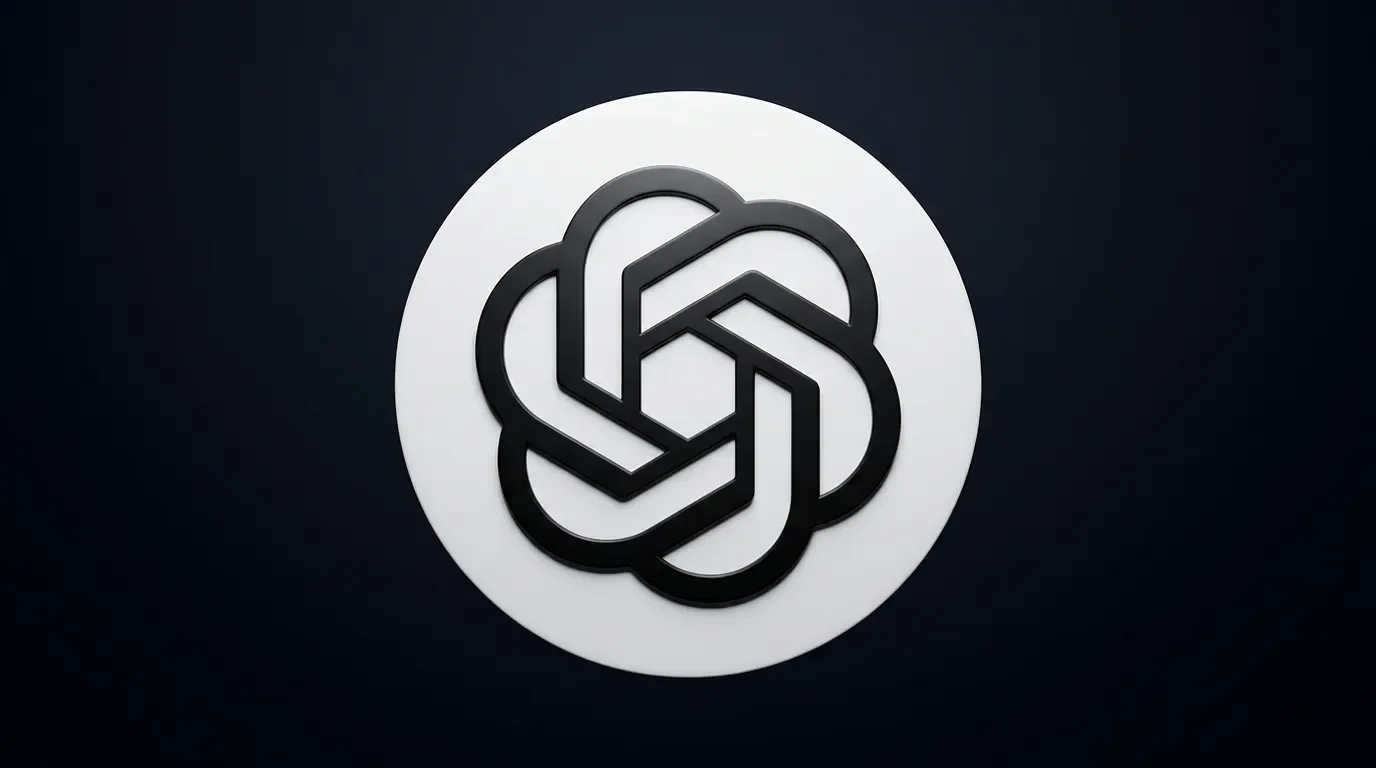 The ChatGPT logo – OpenAI's swirl icon on a white circle – lit with a single overhead key light against a deep dark background, shot in an editorial style.