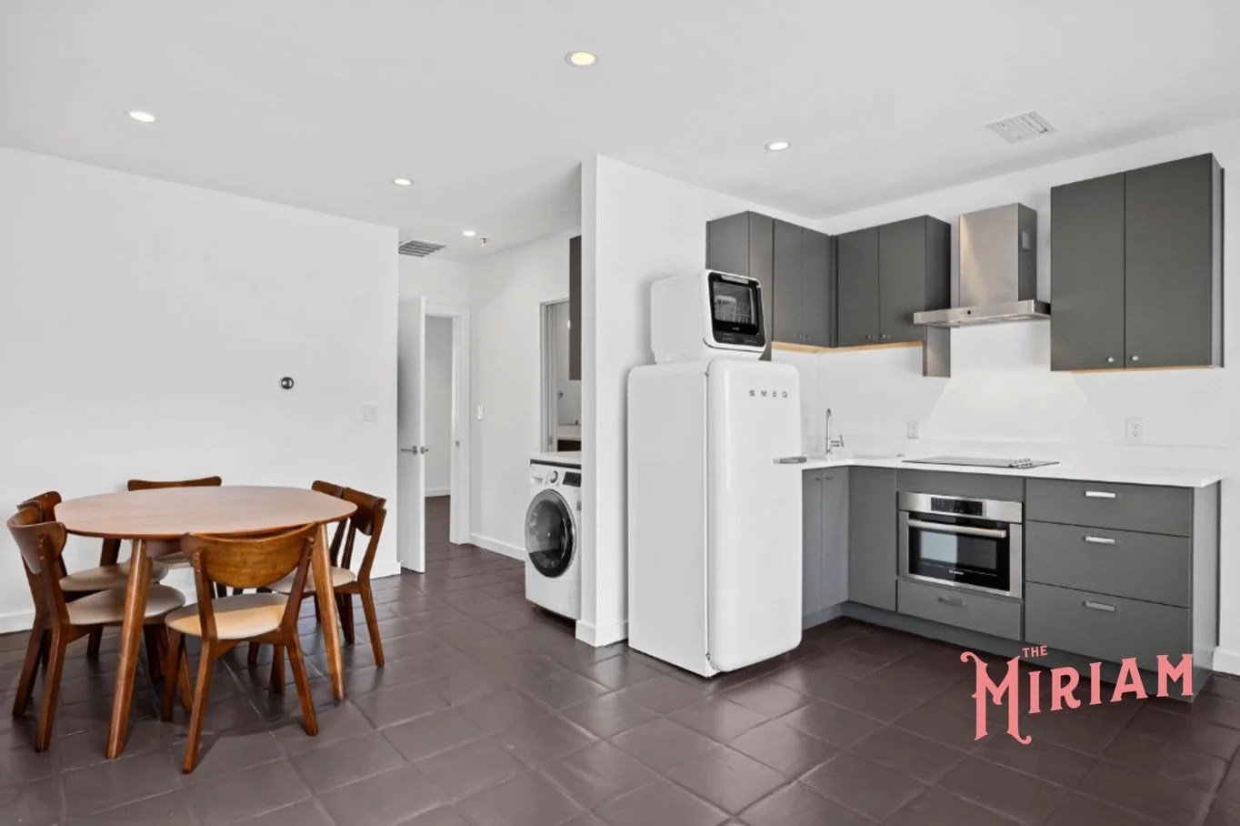 $299,000
1 BR &bull; 1 BA &bull; 500 SF

Boutique living in the heart of Old Enfield. Welcome to Unit 205 at the Miriam Residences, where historic charm meets smart, modern design. This second-floor condo is thoughtfully laid out to maximize every in