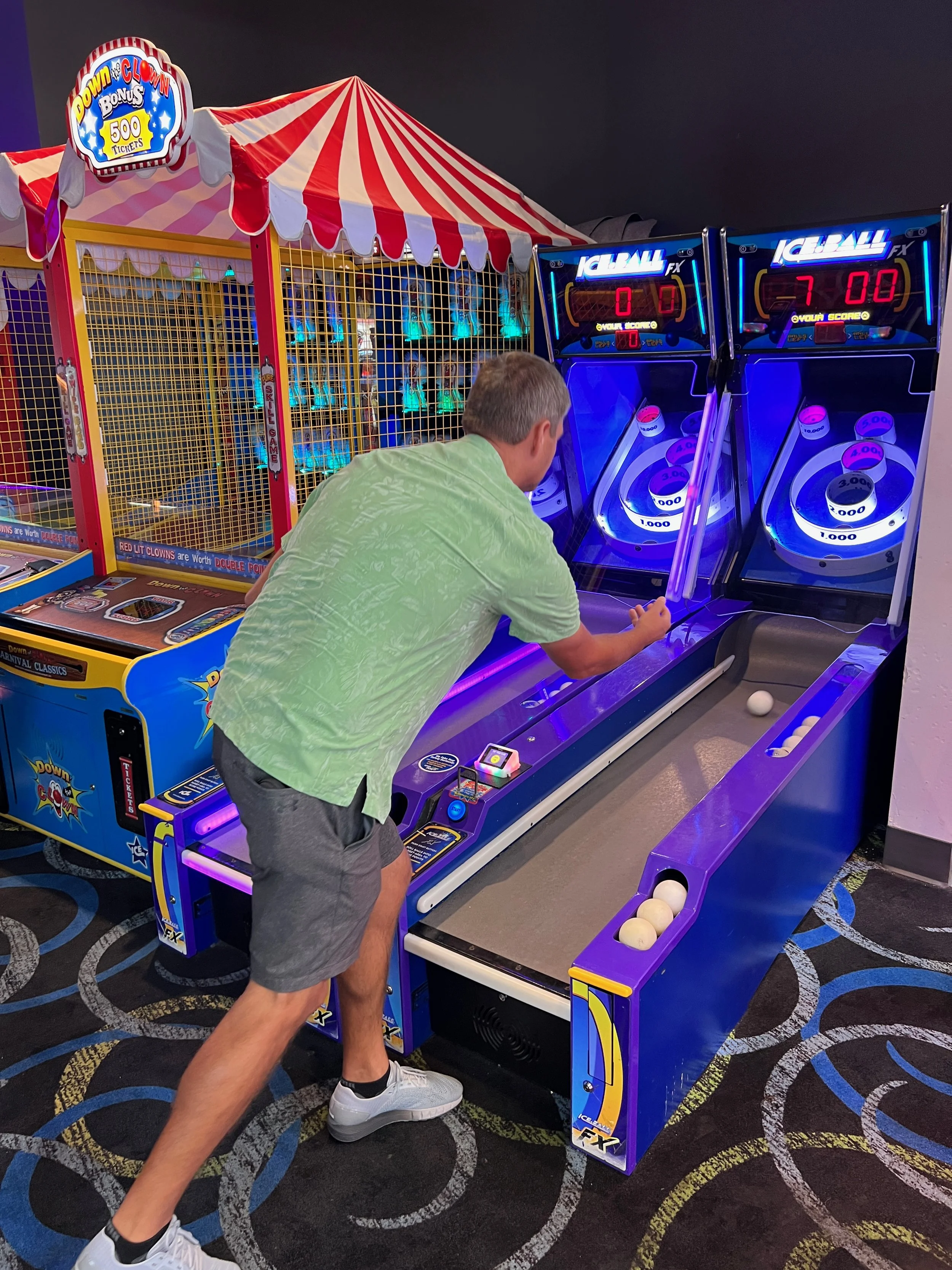 The Orlando DINKS Playing Skee-Ball