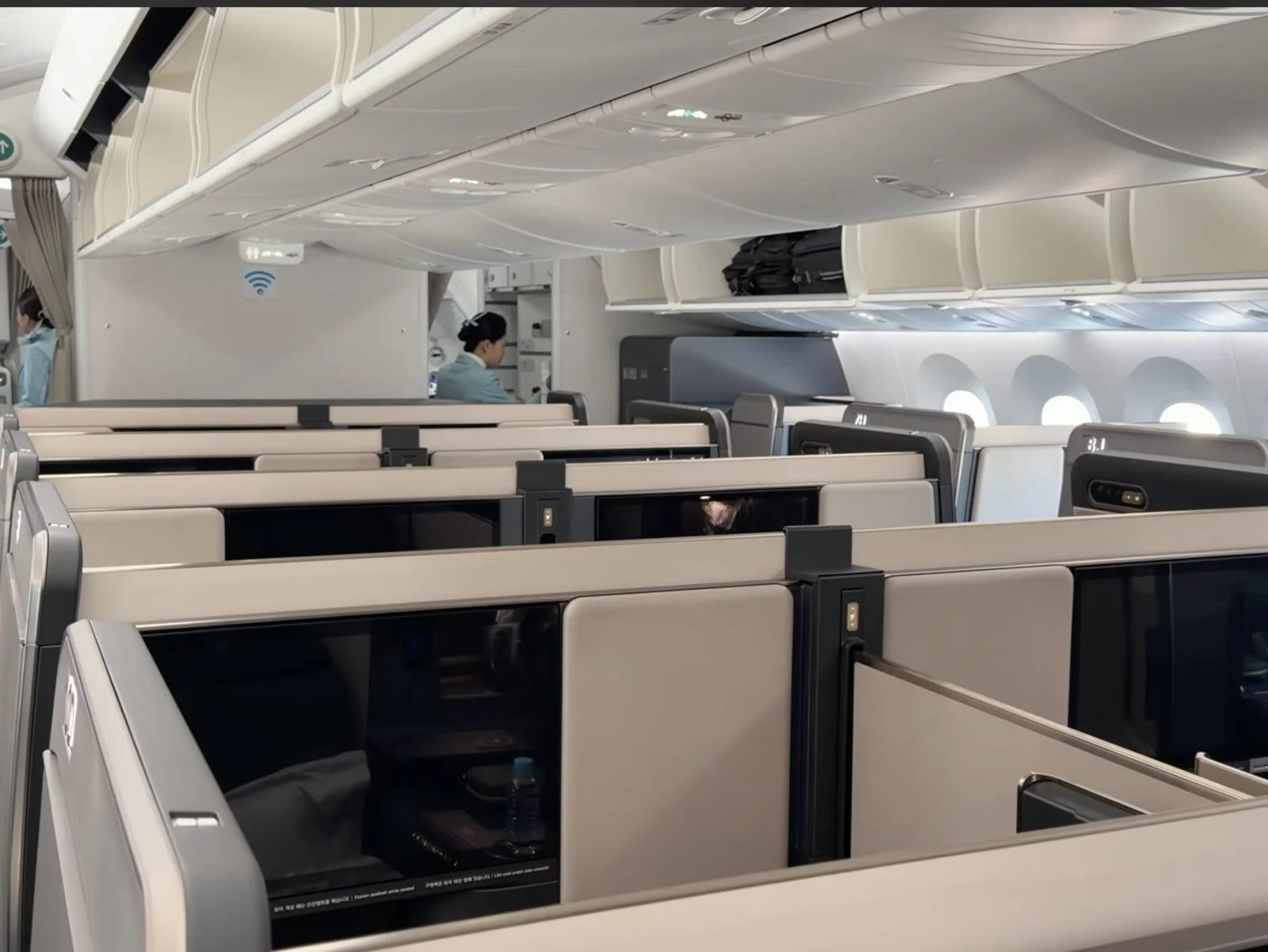 korean-air-prestige-class-flight-attendant-cabin