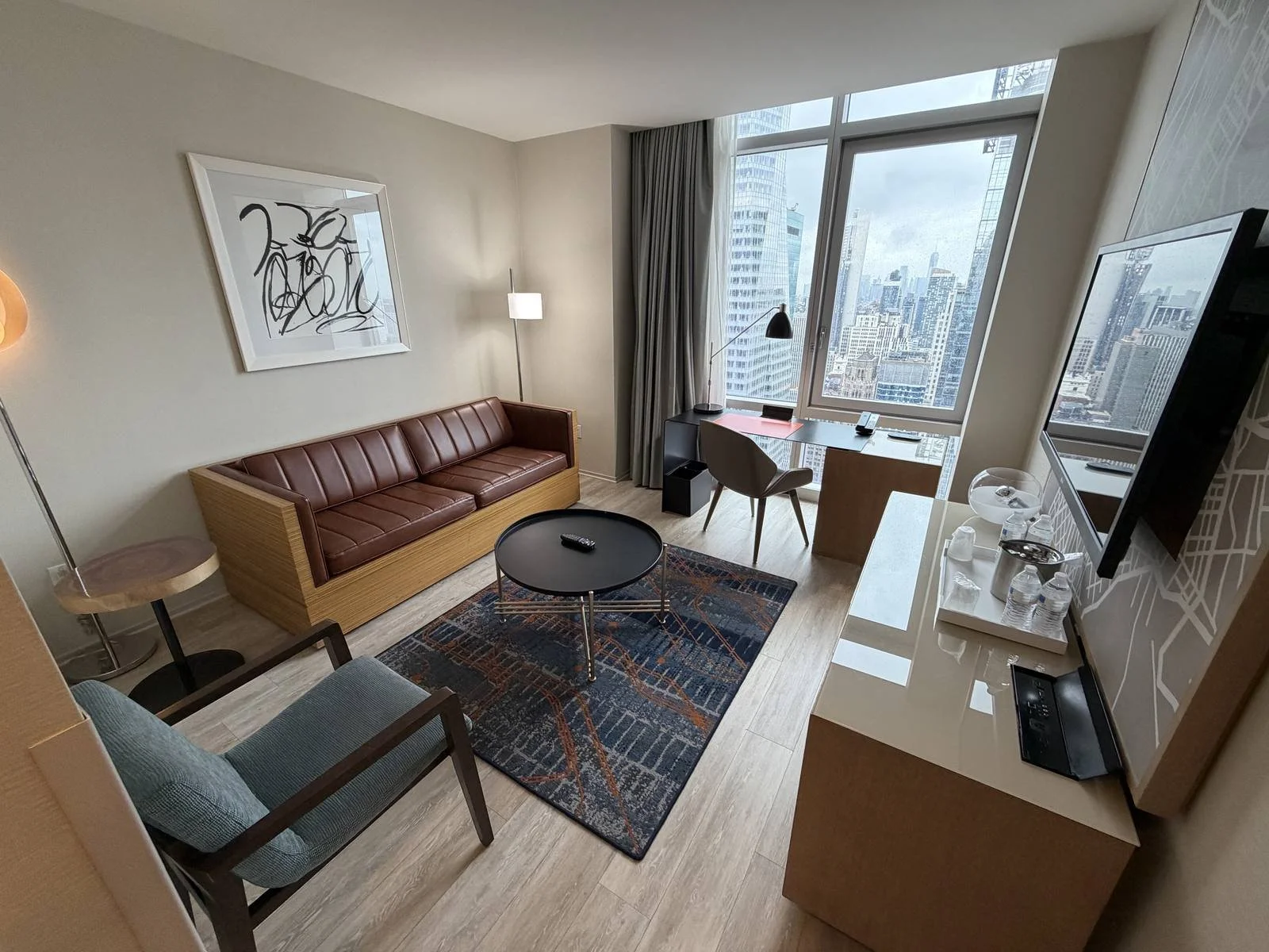 hyatt-centric-times-square-standard-suite-living-area-wide-angle-window.jpg