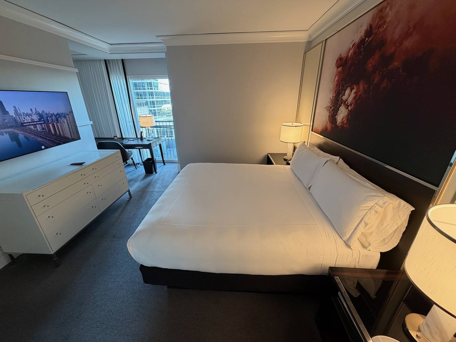 waldorf-astoria-chicago-junior-suite-bedroom-tv-desk-view.jpg