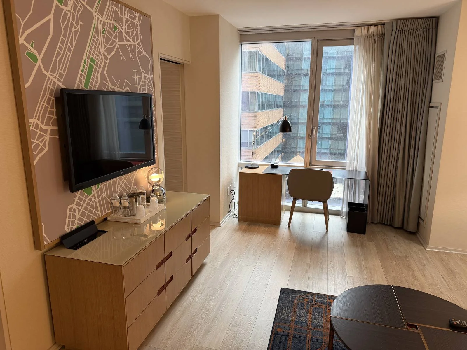 hyatt-centric-times-square-standard-suite-living-area-tv-dresser.jpg