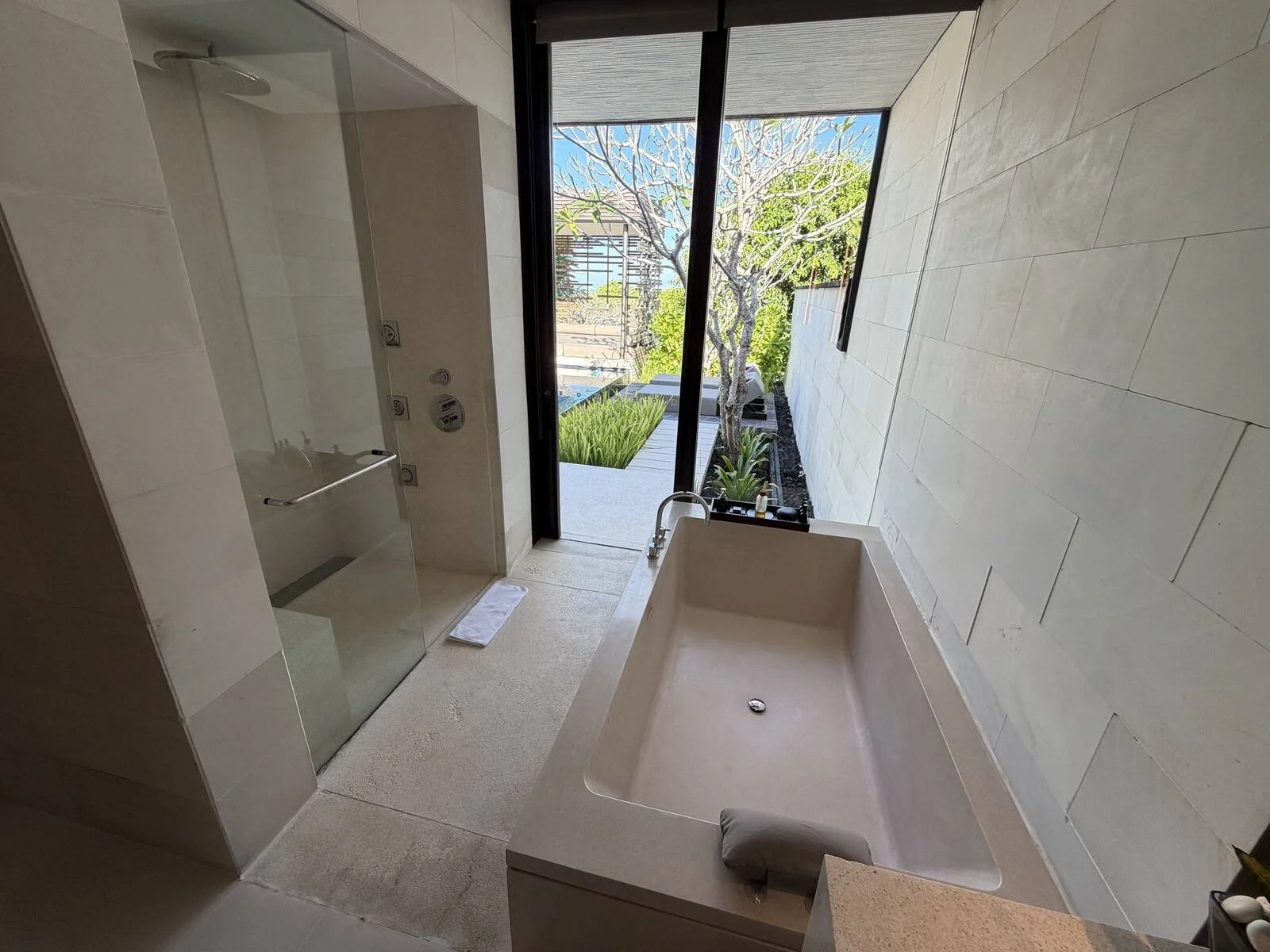alila-villas-uluwatu-villa-bathroom-freestanding-tub-shower