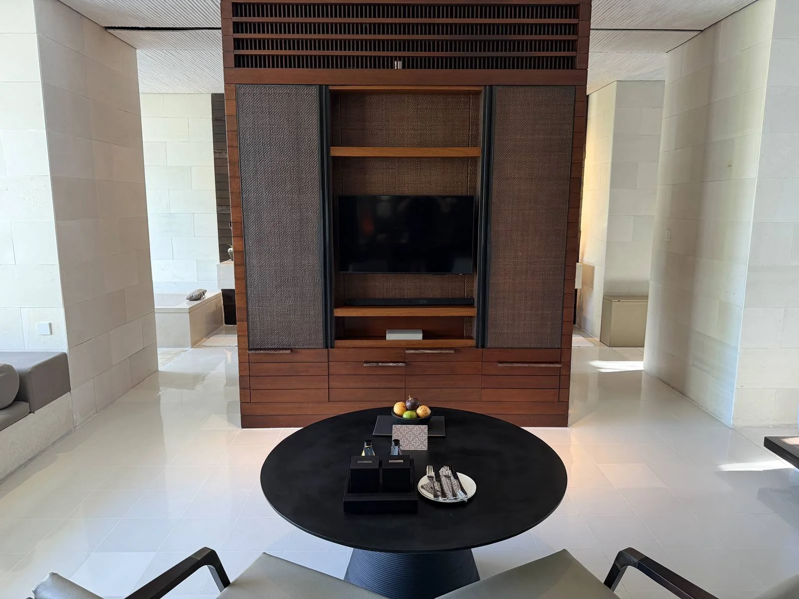 alila-villas-uluwatu-villa-living-room-tv-cabinet-dining.jpg
