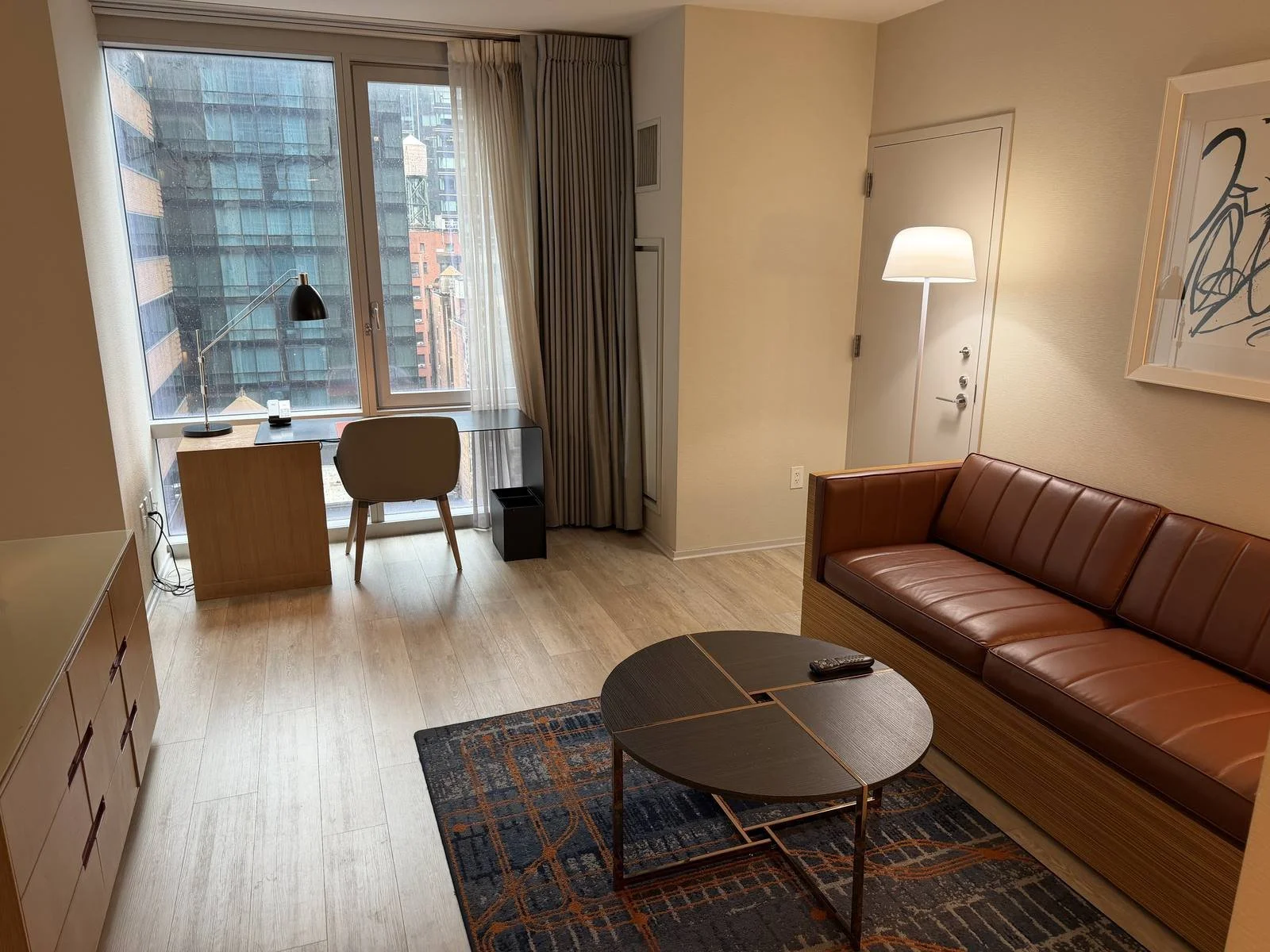 hyatt-centric-times-square-standard-suite-living-area-sofa-desk.jpg
