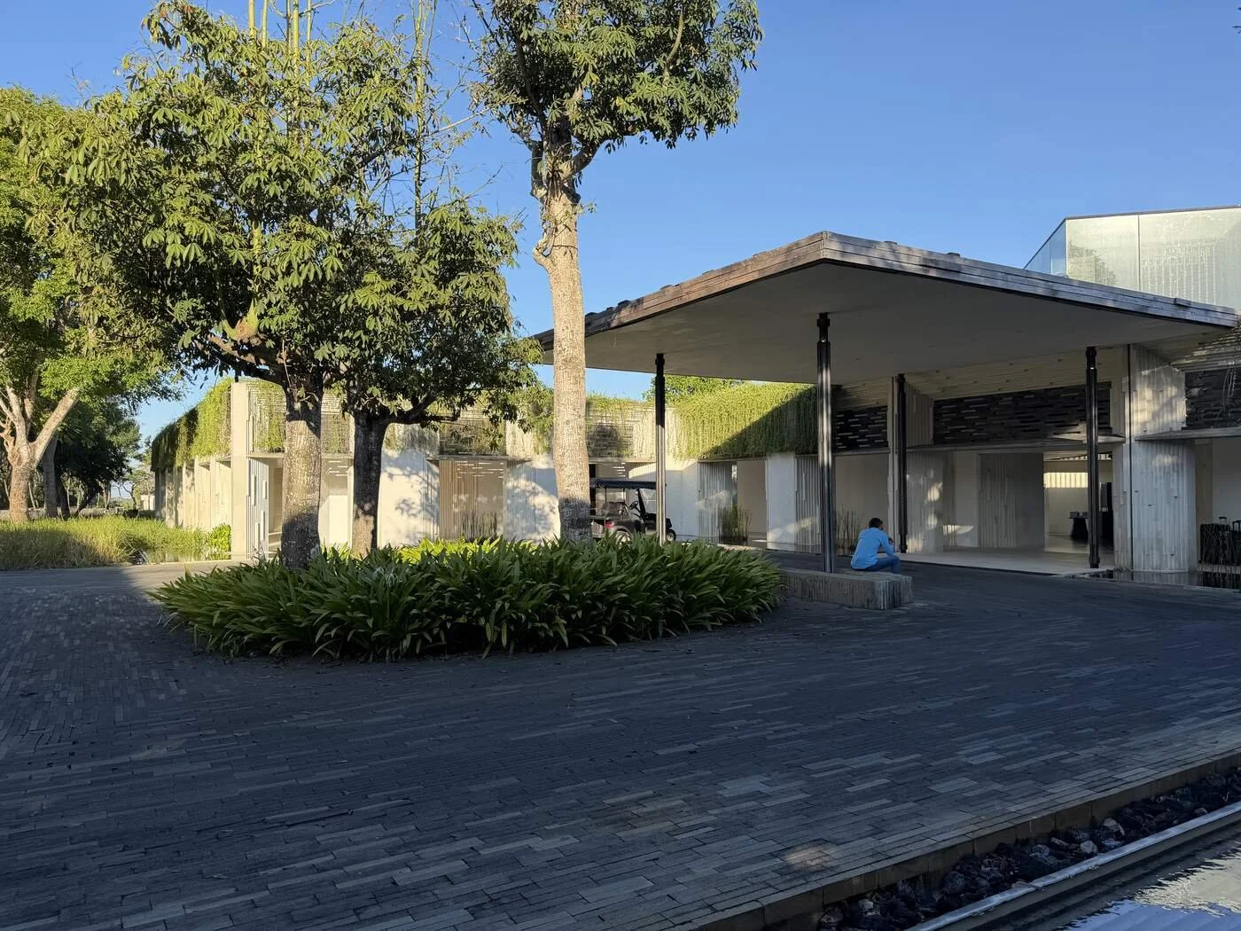 alila-villas-uluwatu-resort-entrance-porte-cochere-golf-cart.jpg
