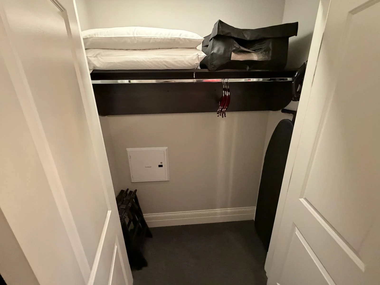 waldorf-astoria-chicago-junior-suite-closet-luggage-rack-iron.jpg