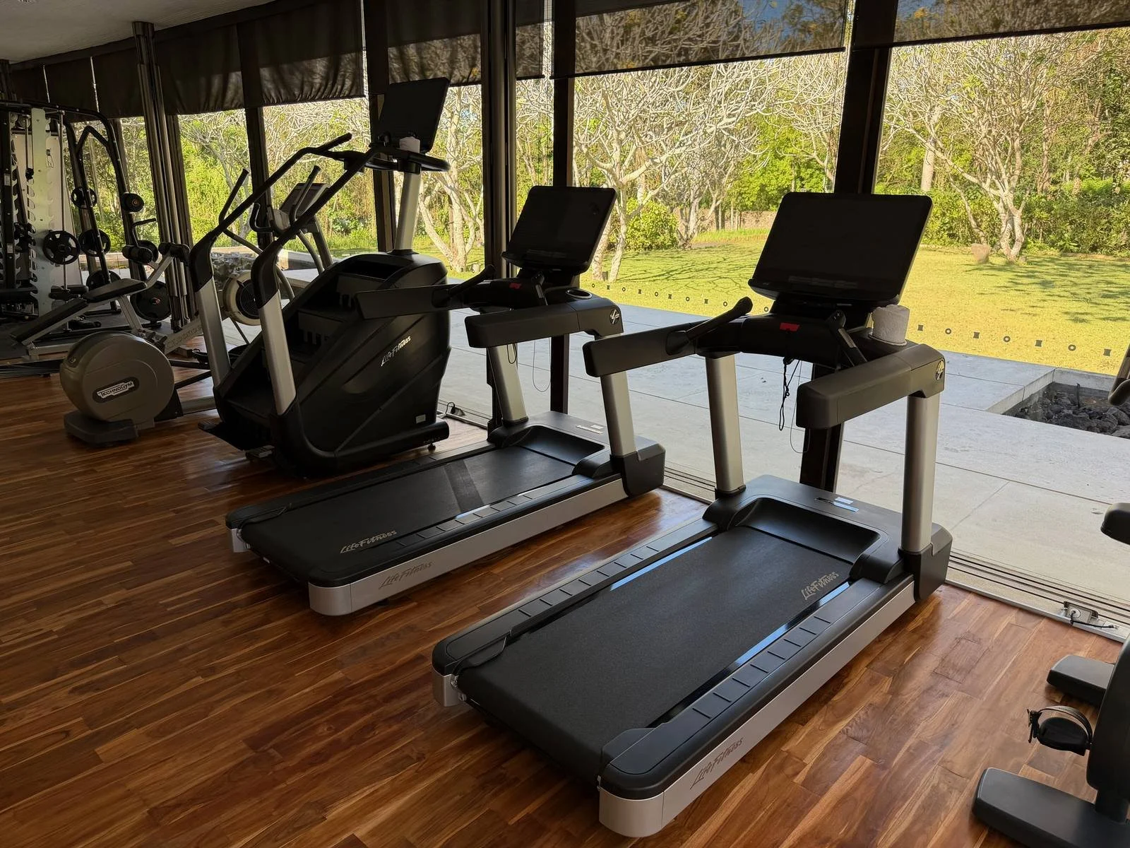 alila-villas-uluwatu-gym-treadmill-elliptical-garden-view