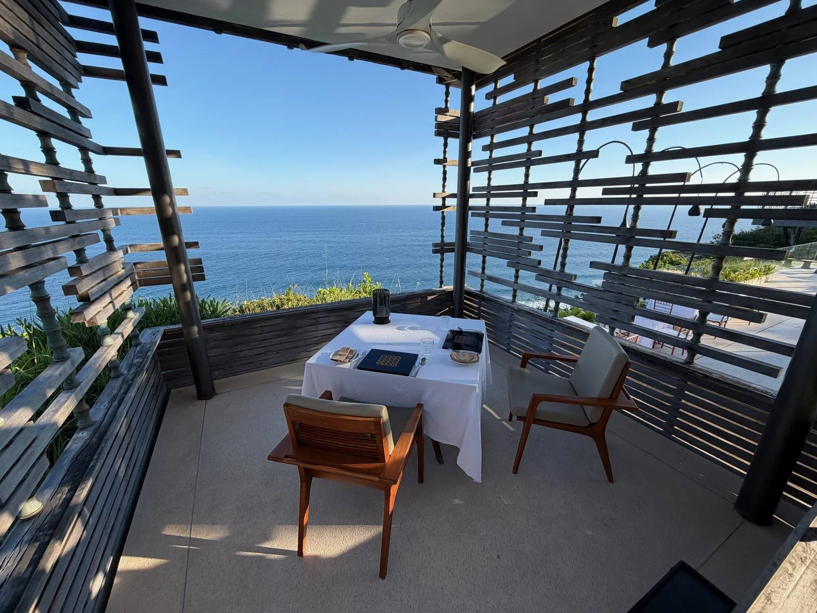alila-villas-uluwatu-private-cabana-dining-table-ocean-view.jpg