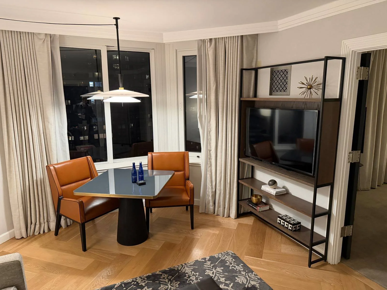 the-london-nyc-one-bedroom-suite-dining-table-leather-chairs