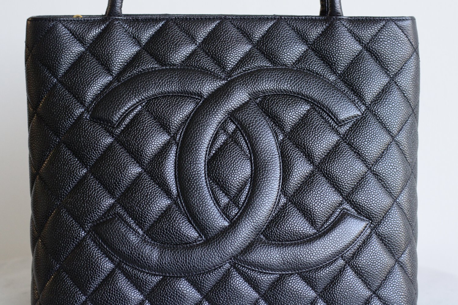 chanel black caviar leather medallion tote