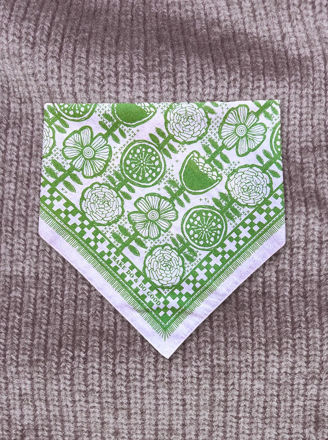Sugar Camp cream bandanna with sprout green ink features hand-drawn Scandinavian florals florals and stitches collaged on a knit background