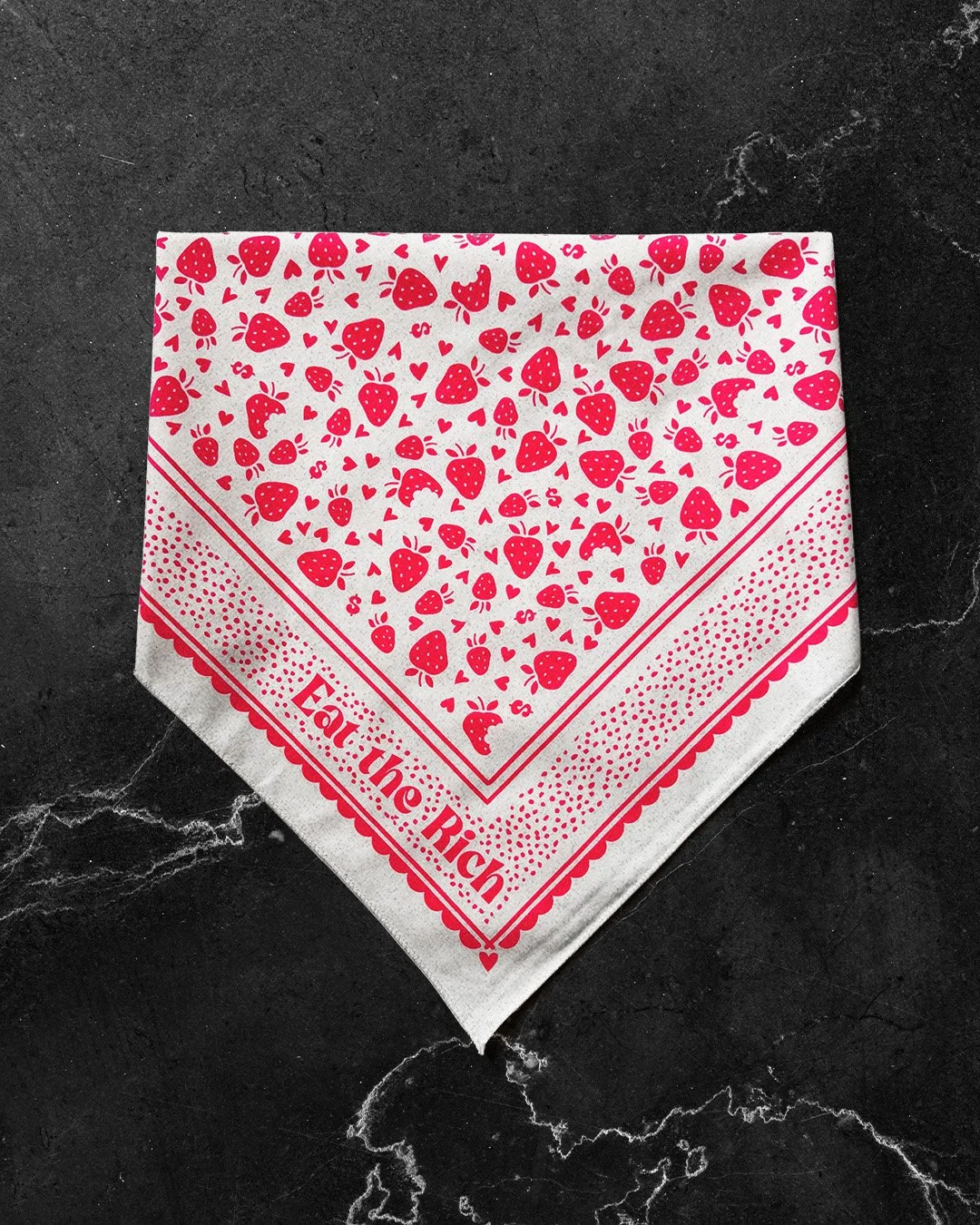 Cream “Eat the Rich” bandana with red strawberry, heart, and dollar sign print on black marble background