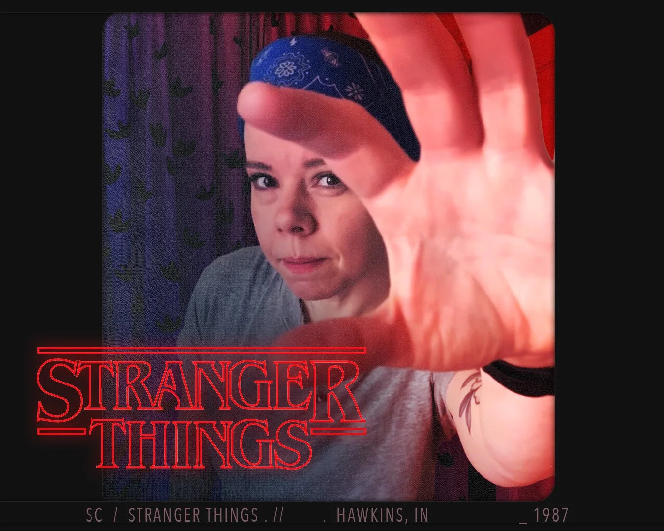 the stranger things title floats over an image of a woman wearing a blue bandana, imitating El's training outfit. Her hand is forward as if she will use her powers on you and she looks into camera.