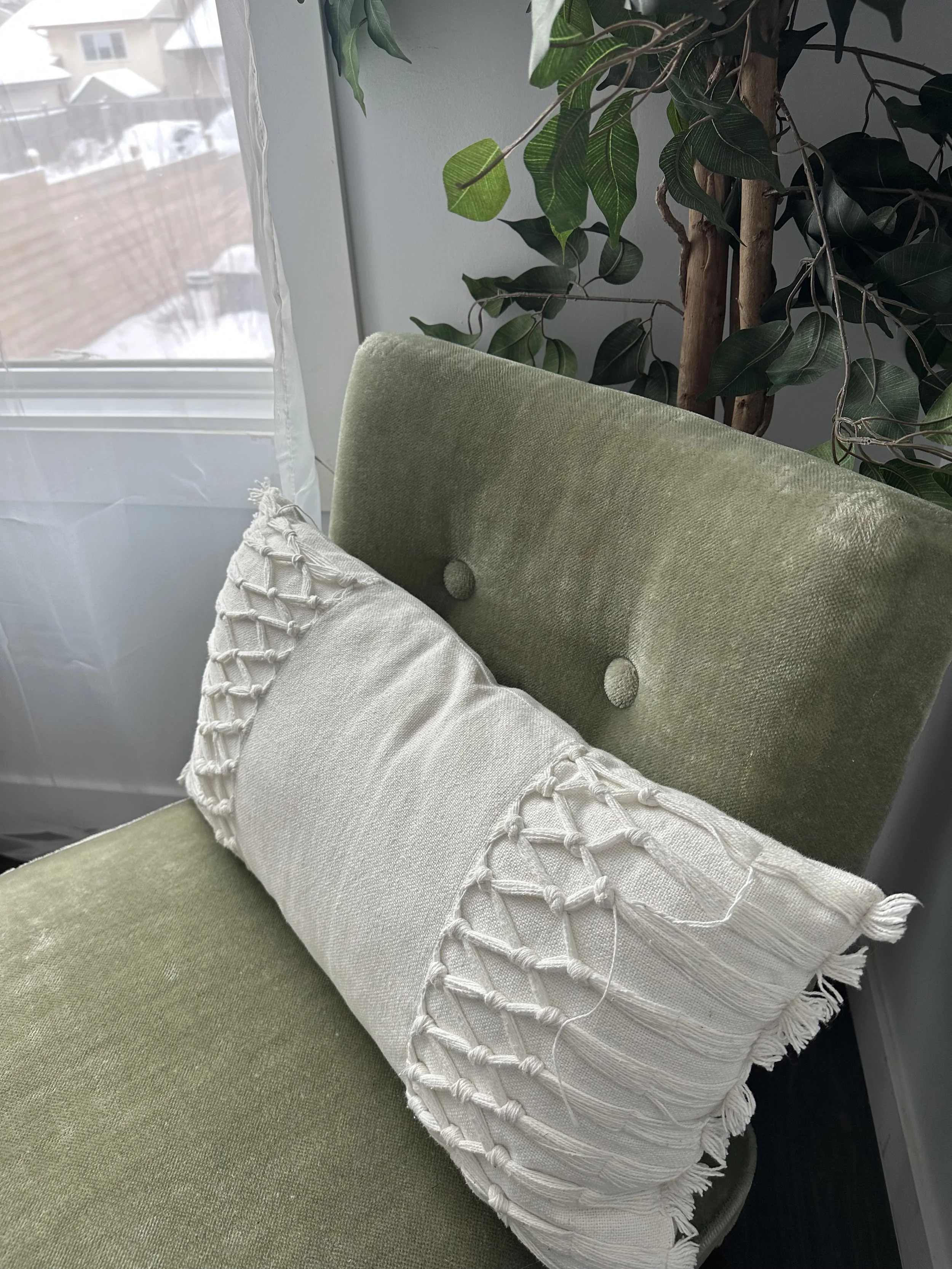 Edmonton photographer's dream: cozy bedroom set with natural light and comfortable decor for photoshoots.