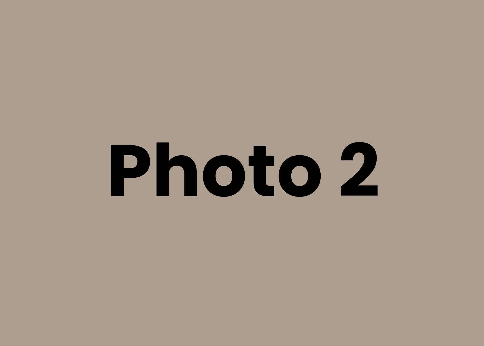 A placeholder image with the text 'Photo 2' on a beige background.