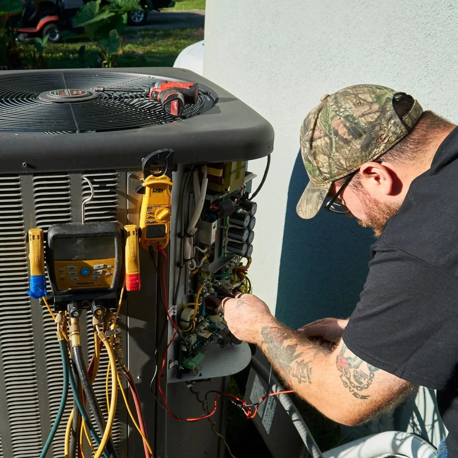 A technician performs HVAC duct fogging in a Tampa home, distributing disinfectant mist through ductwork to reduce odors, microbial growth, and moisture-related contaminants.
