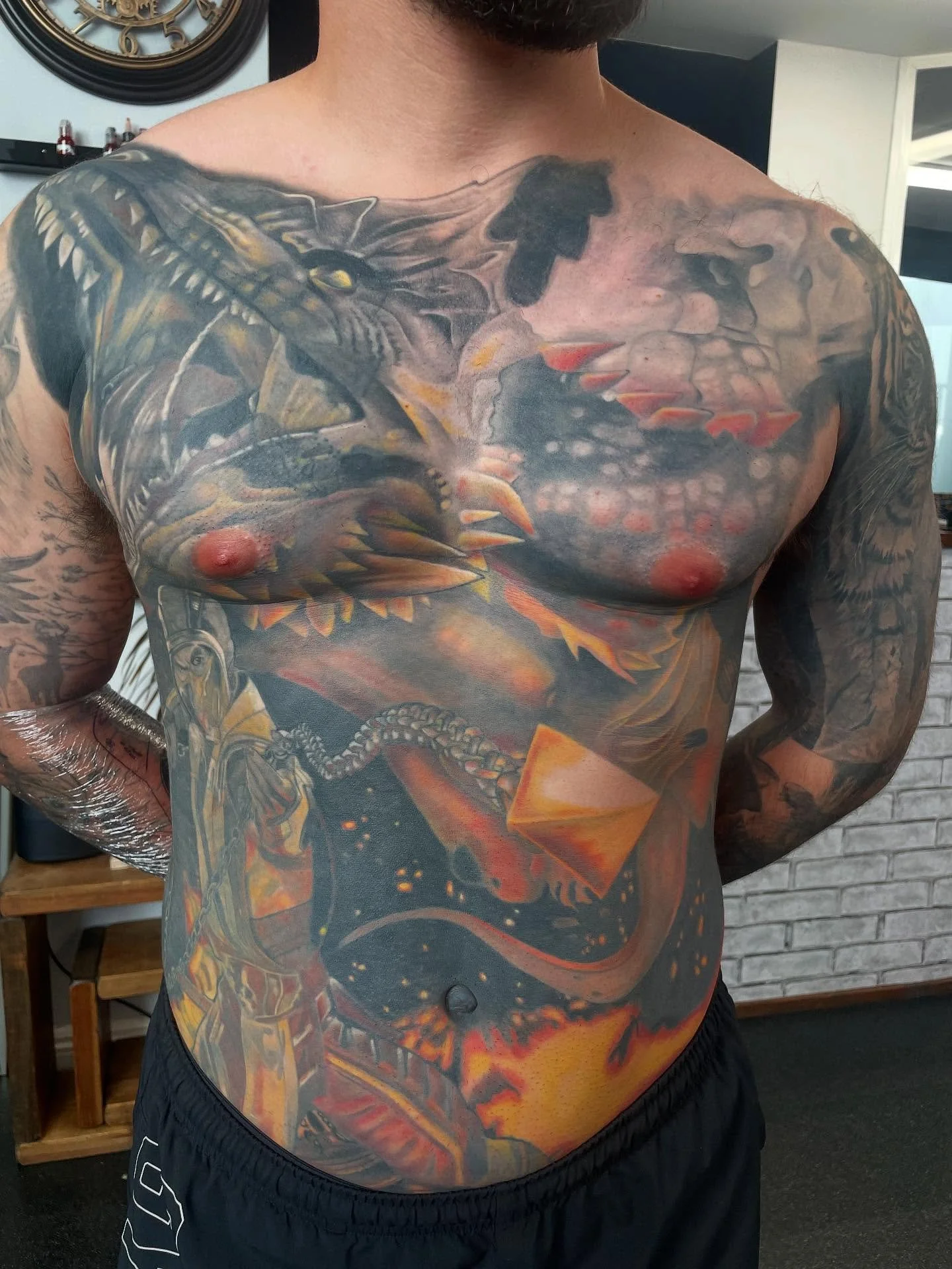 Massive multiple coverup front piece for @ryanwilley96  and on to the next. Maybe one day I&rsquo;ll get to tattoo some virgin skin on this dude!! #lthirteenuk #lthirteenfamily #teignmouth #houseofthedragontattoo #mortalcombattattoo