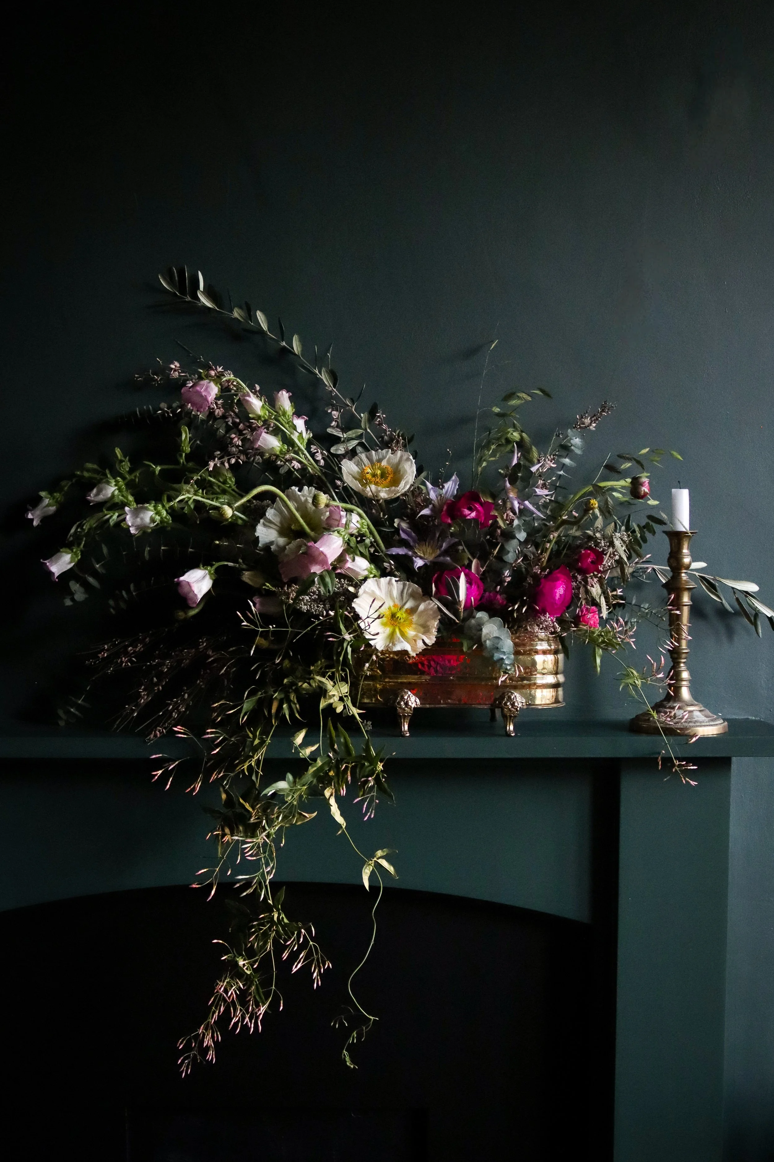 Trailing and wild floral arrangement for the mantle