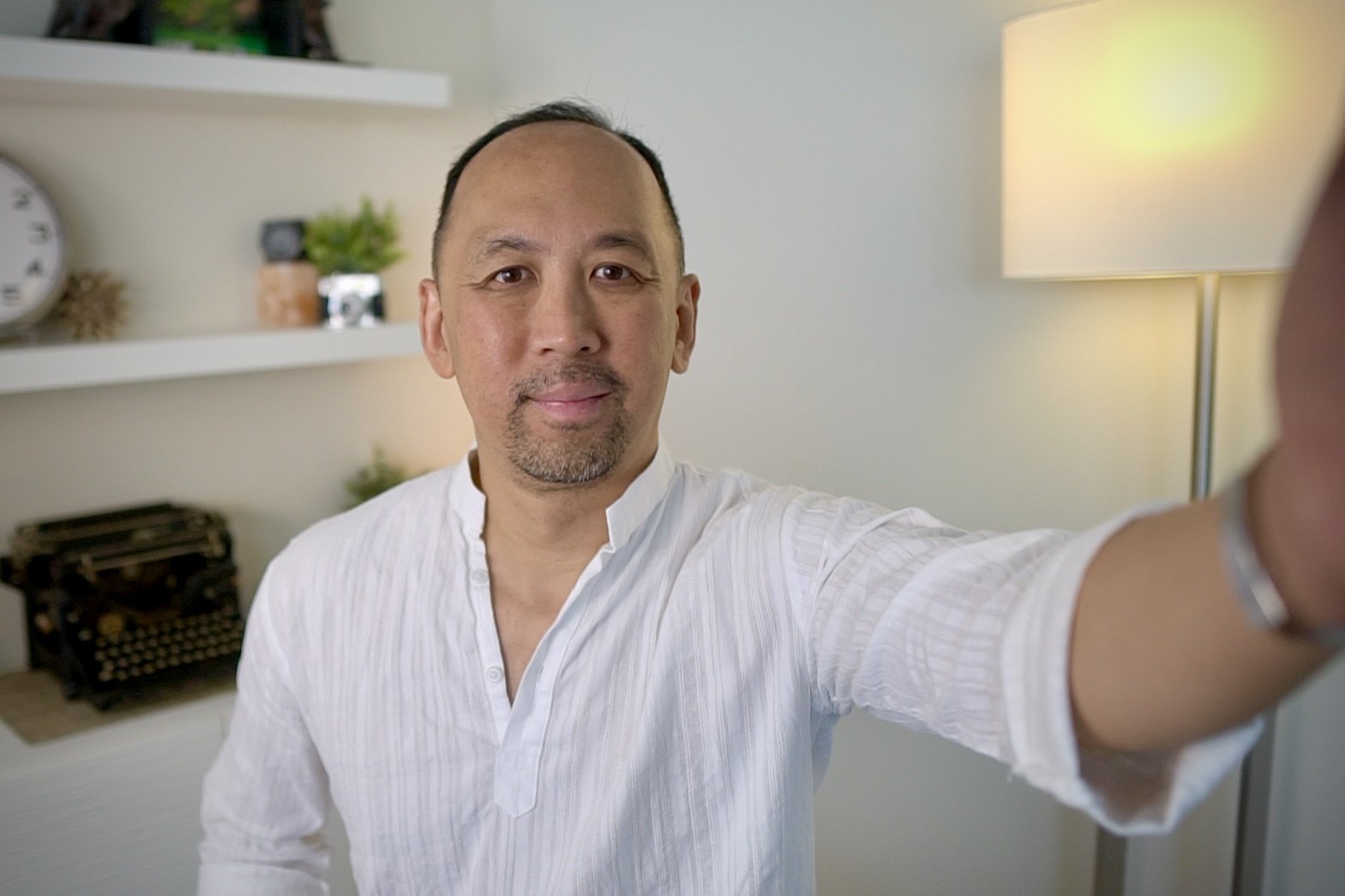 Gavin Koh, YouTube coach in Victoria BC, preparing to record a video in his home workspace.