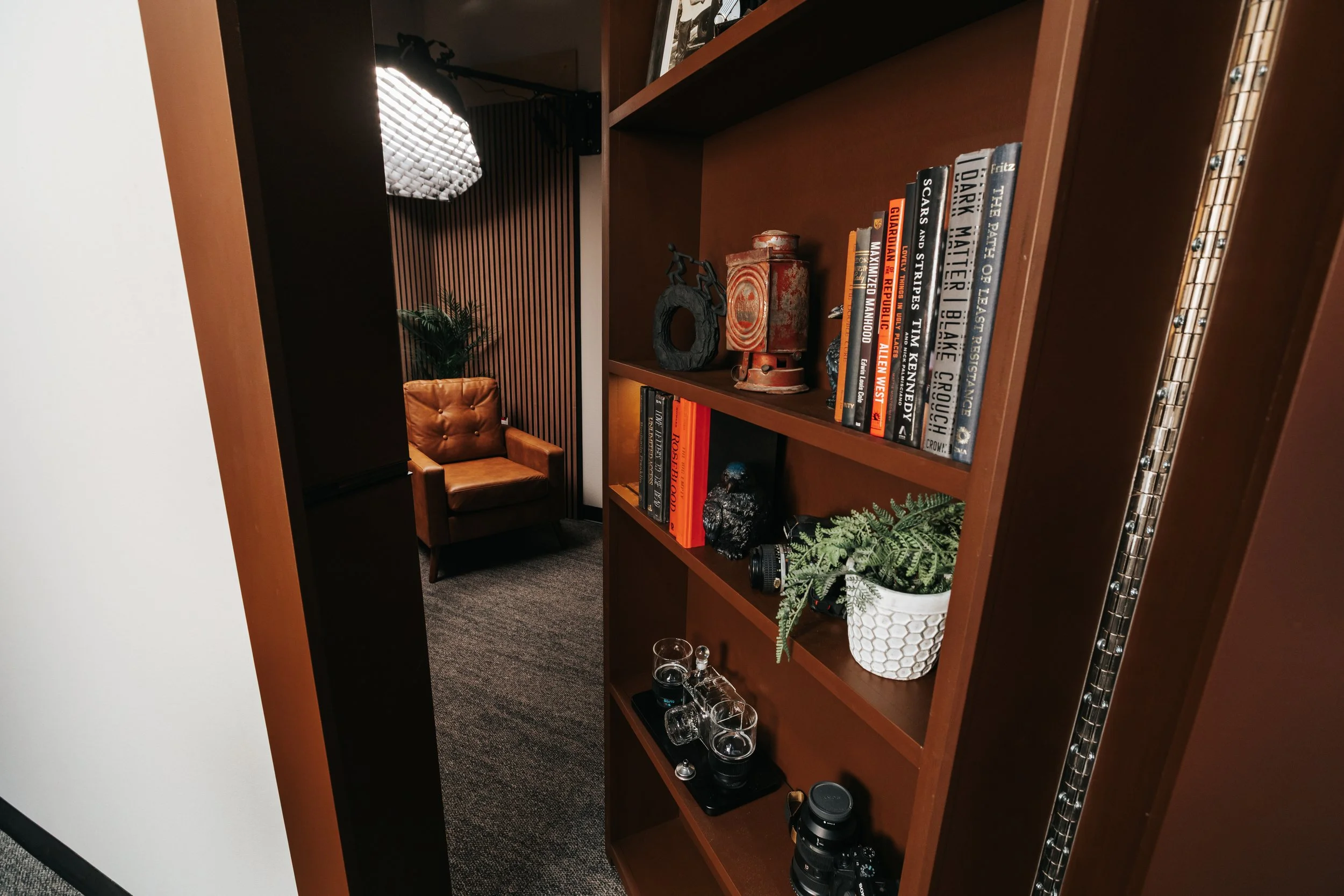 hidden door bookcase showing room behind hidden door