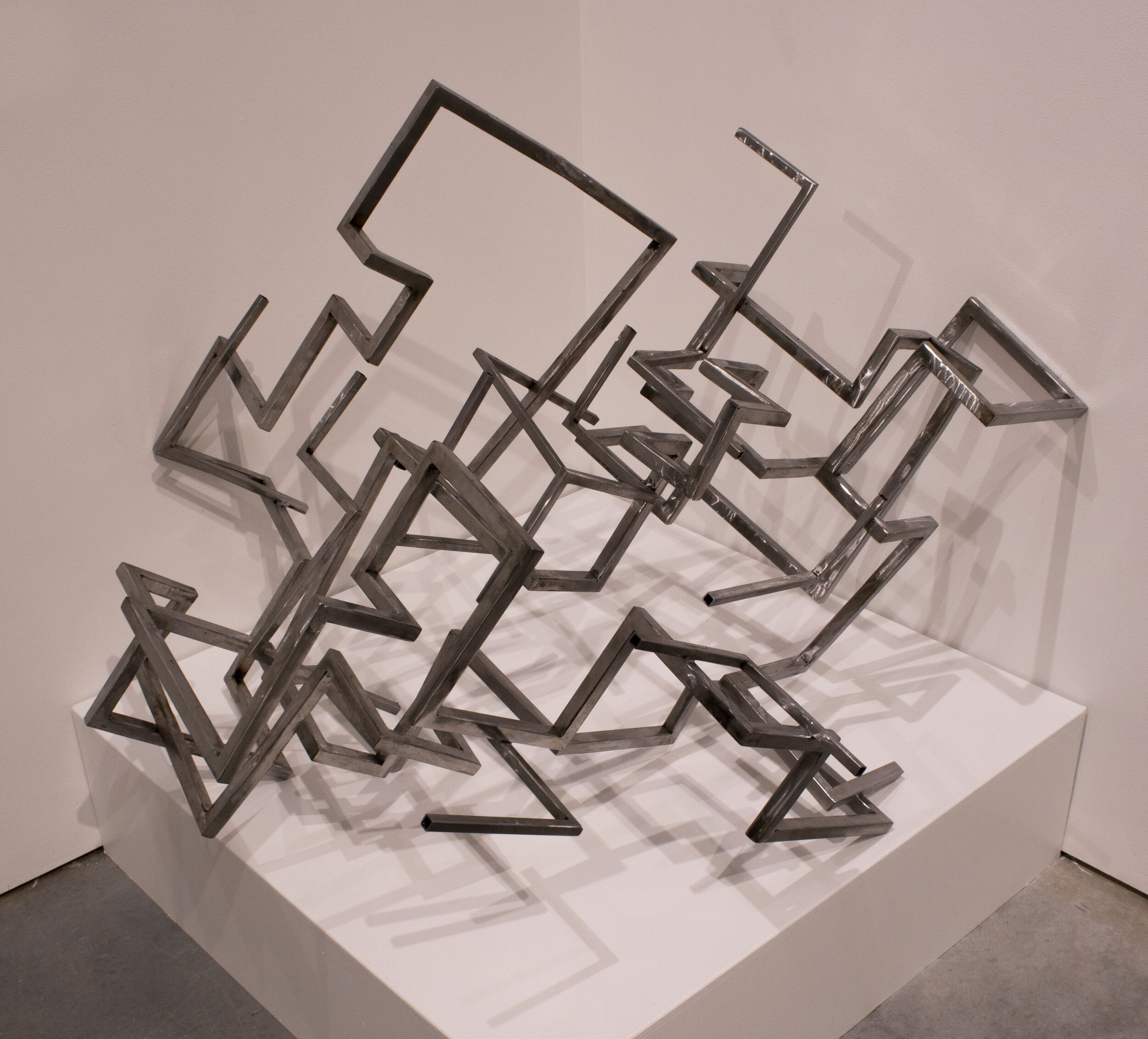 Metal Sketch: 4’ x 3’ x 3’; Steel; November 2019;
This is a 3D representation of a scribble that I am always found doodling in the margins of my notebooks. The piece is made of 90-degree angles but comes together in an organic blob shape.