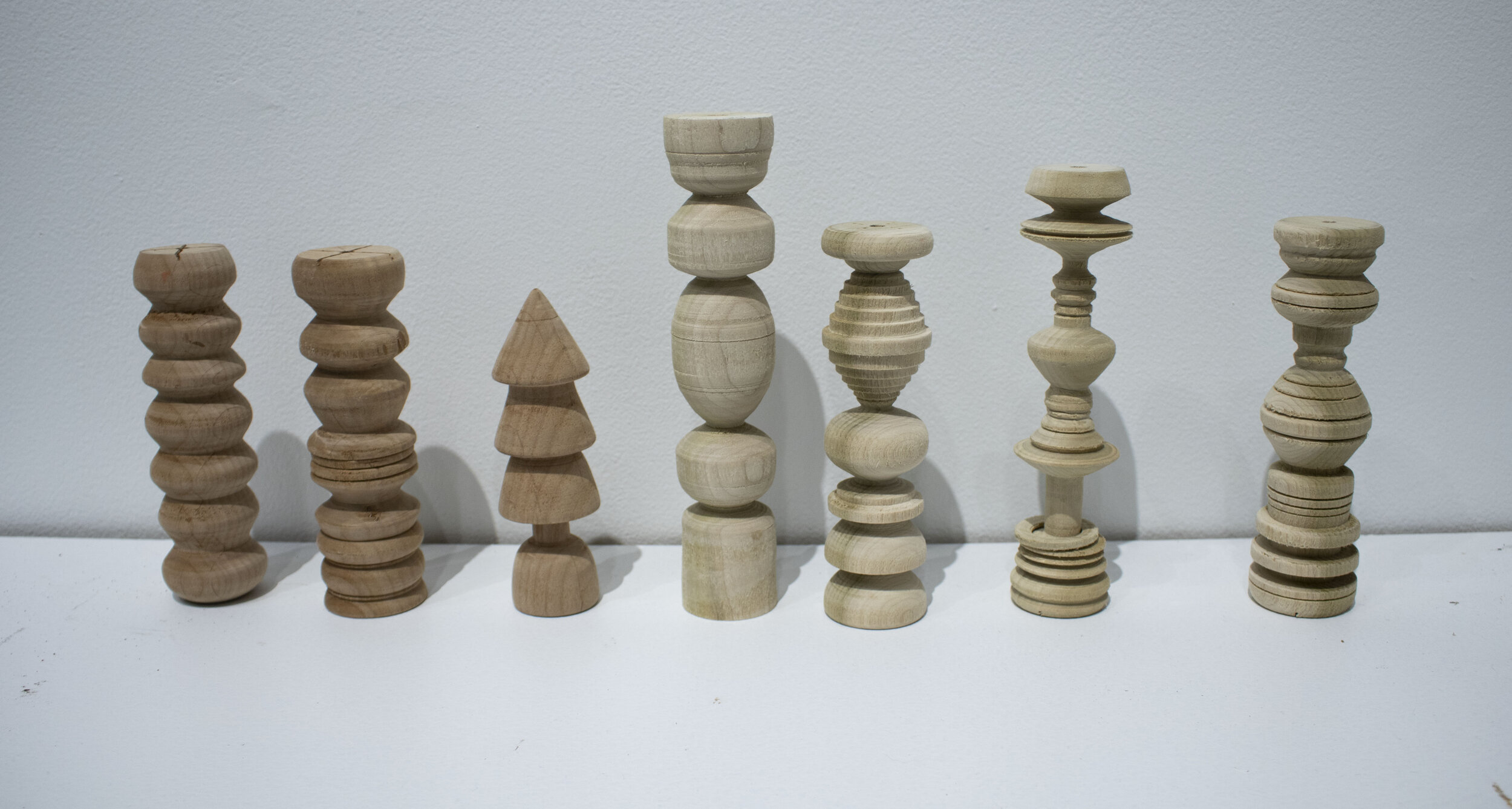 Spindles: 24” x 1.5” x 6~10”; Cedar and Osage Orange; September 2019;
The first set of spindles made after learning how to turn wood on the lathe. Seven in total, various sizes. Some went on to become candlesticks, or live luxurious lives as gifts fo