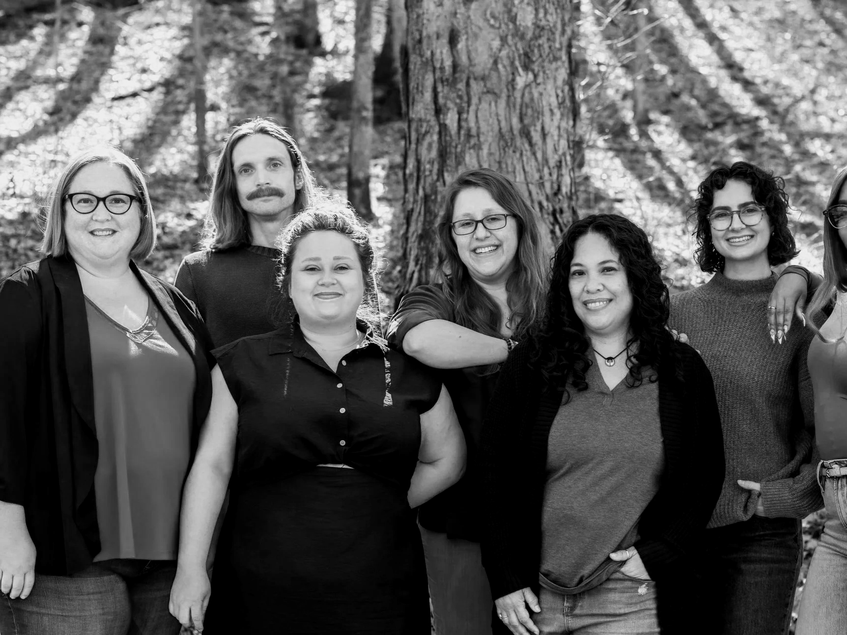 black and white photo of five diverse clinicians