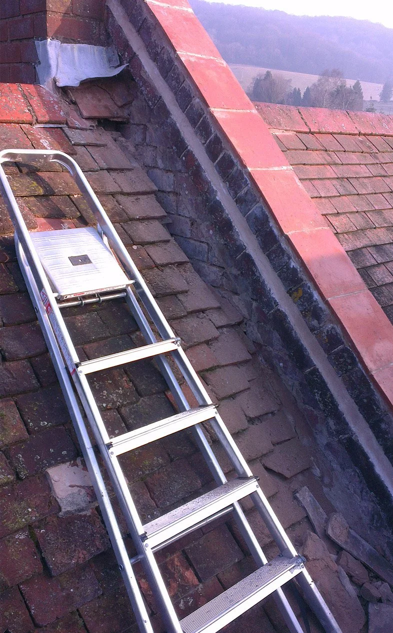 Fixing a roof leak with lead soakers