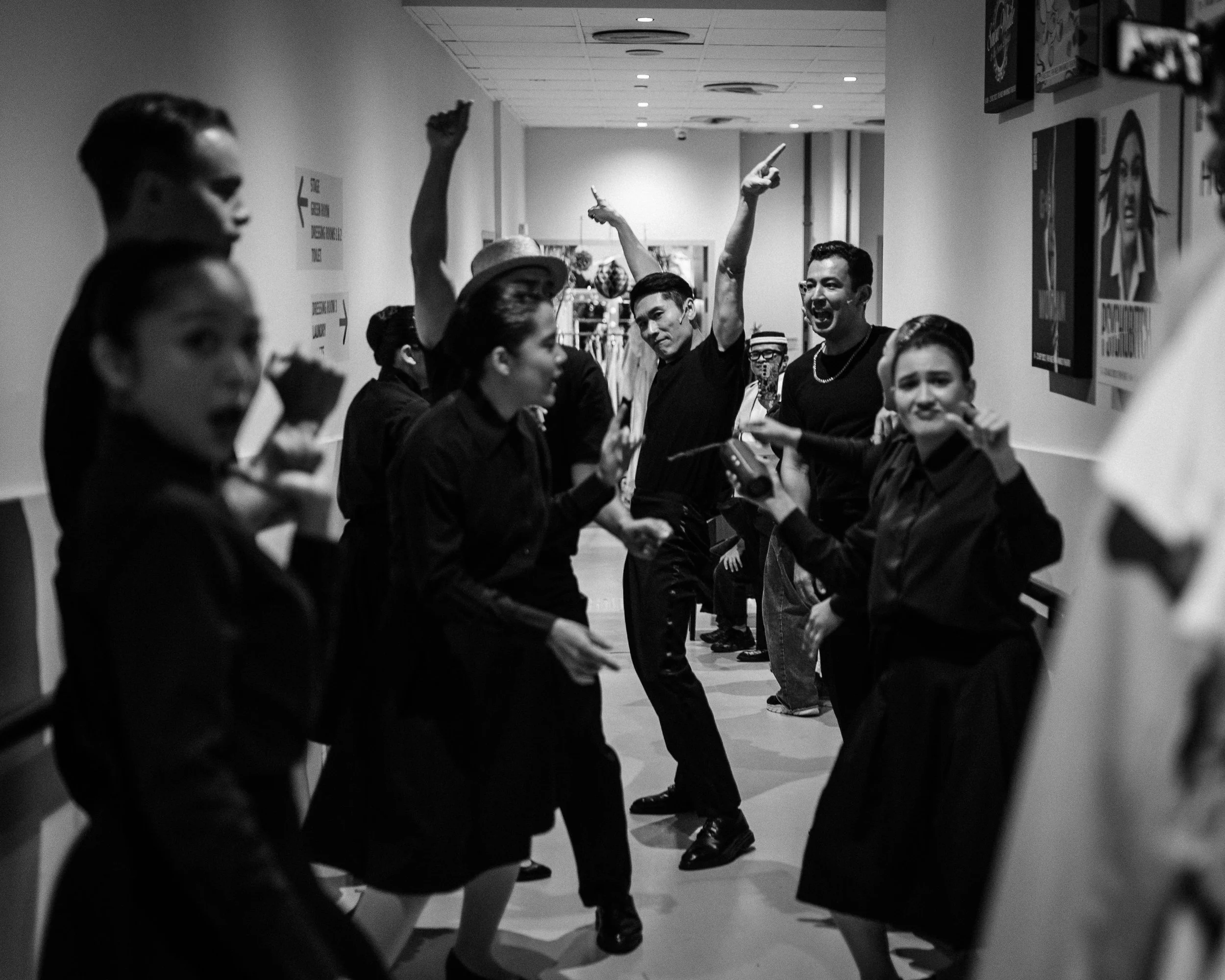 The cast of Hotel dance backstage as they prepare to open Part 1. They do this every show.