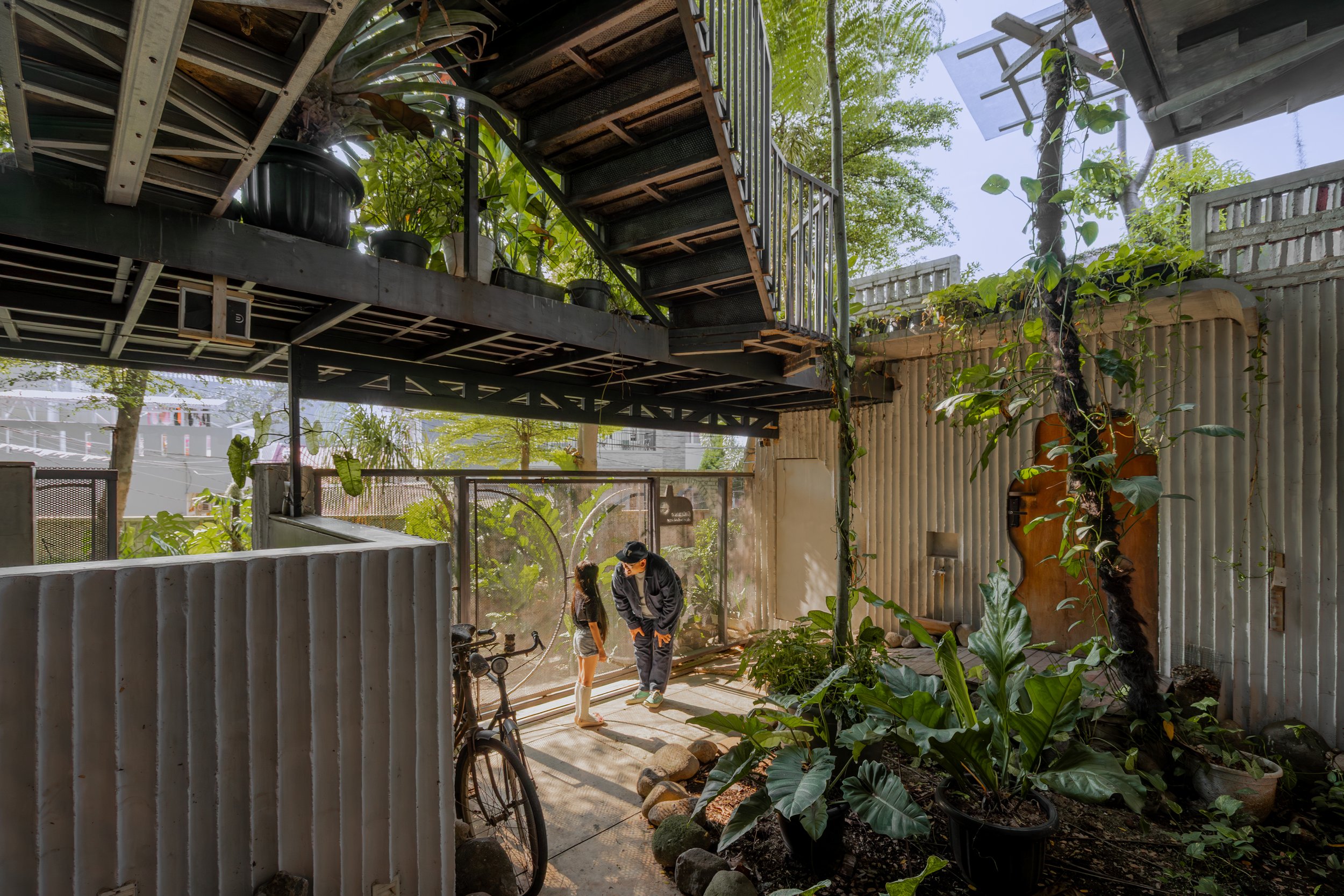 Library entrance at Kampoong Guha, Jakarta, by Realrich Architecture Workshop (RAW). Photo: Lu Luil Ma Nun