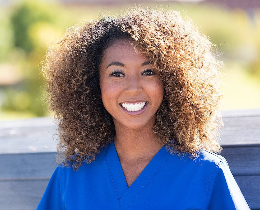 woman wearing blue medical scrubs