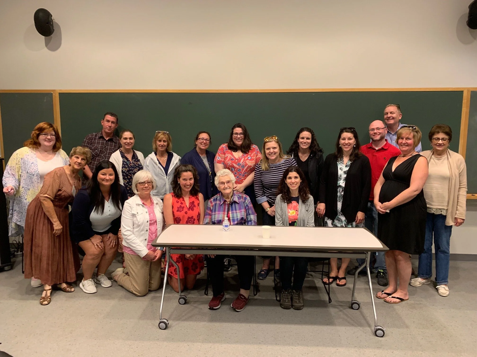 Teachers meeting with a Holocaust survivor at the United States Holocaust Memorial Museum.