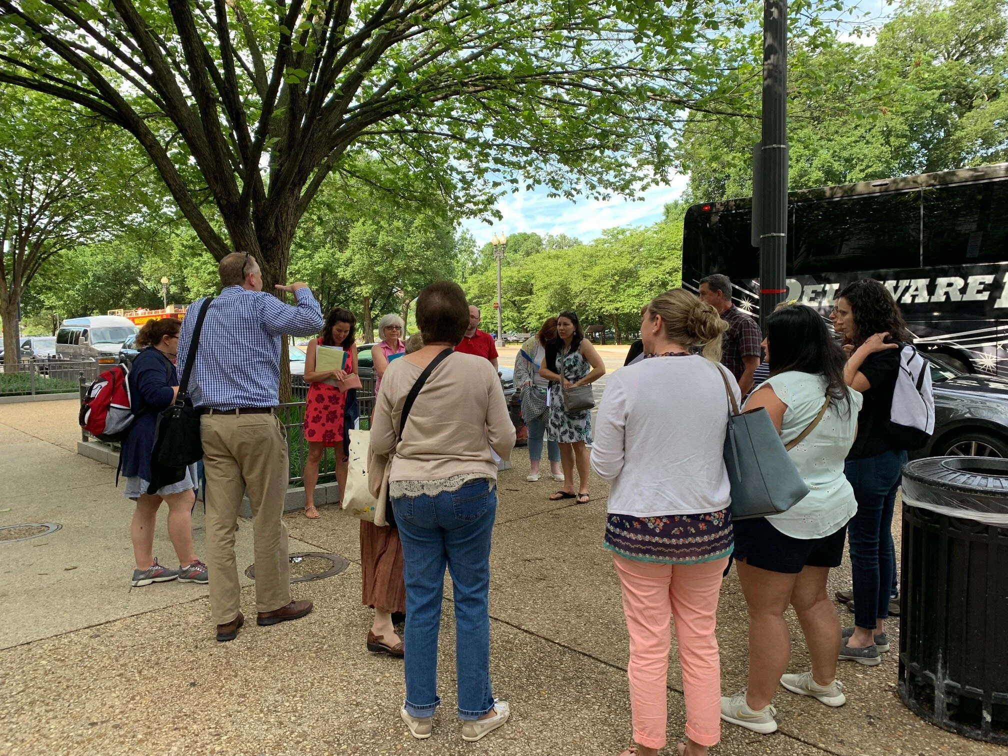 John Hanson, Holocaust Education Advisory Committee member, reviews the day's visit.