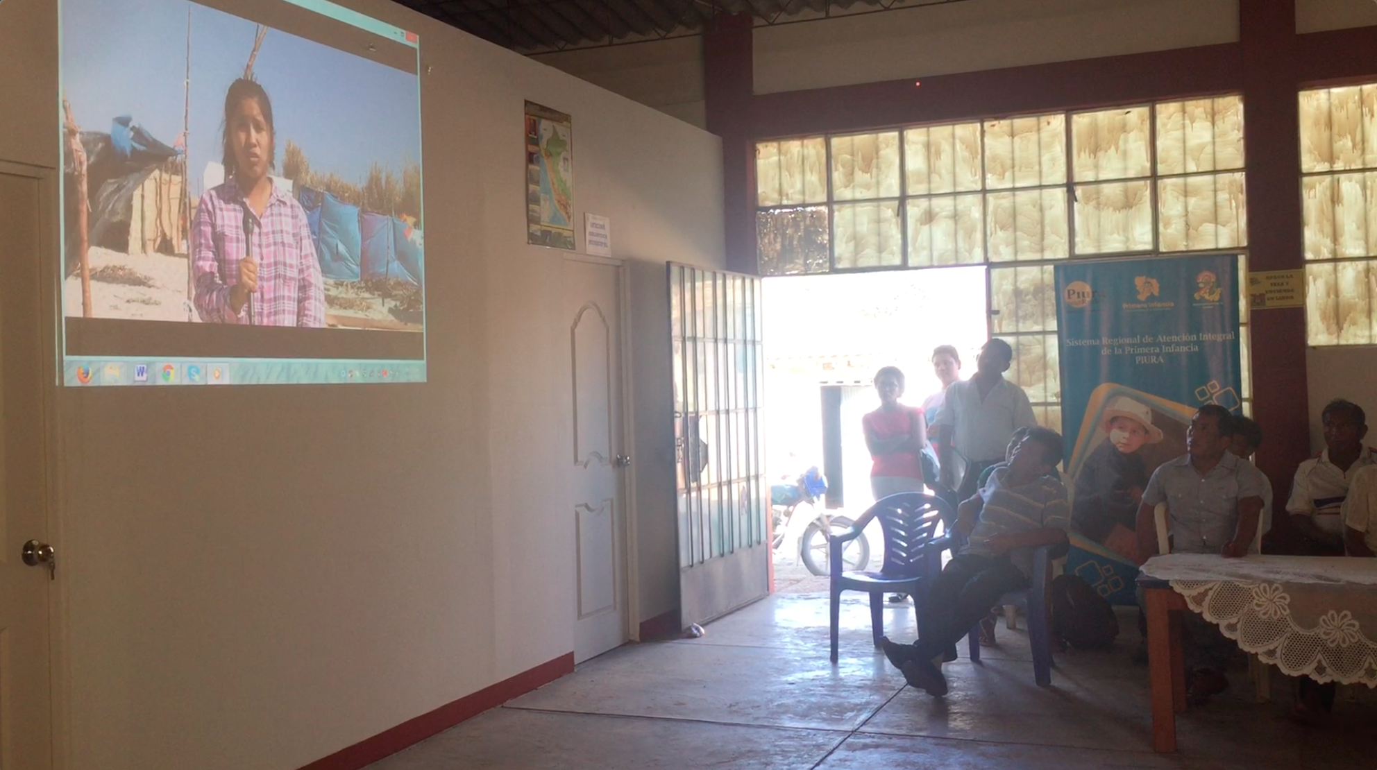 Maria, a youth from an IDP camp, voices her recommendations to municipality authorities and humanitarian partners during a camp management coordination meeting