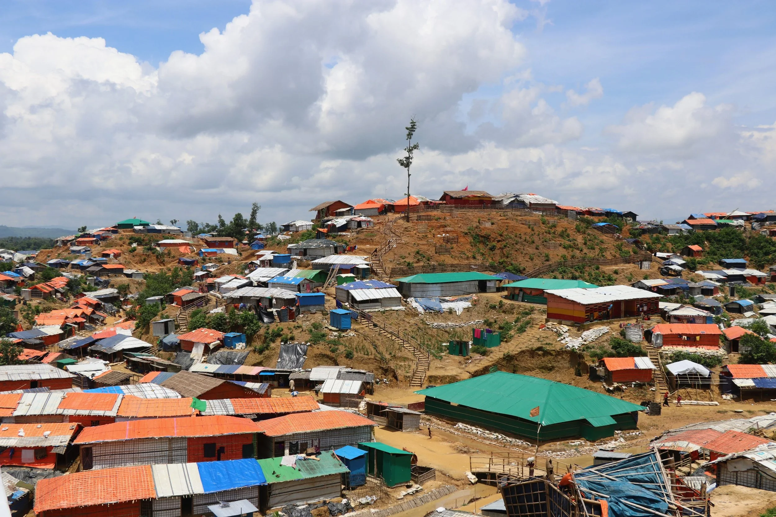 Advancing a collective model for communication and community engagement: lessons from the Rohingya response