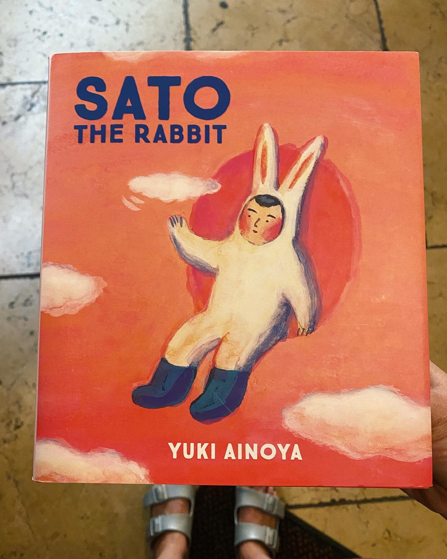 If there is a single children&rsquo;s book that may just be my spirit book, Sato the Rabbit would be a top contender. Translated from Japanese, Sato, a boy-wearing-a-rabbit-costume, explores the beautiful world all around us: the sky, the ocean, a wa