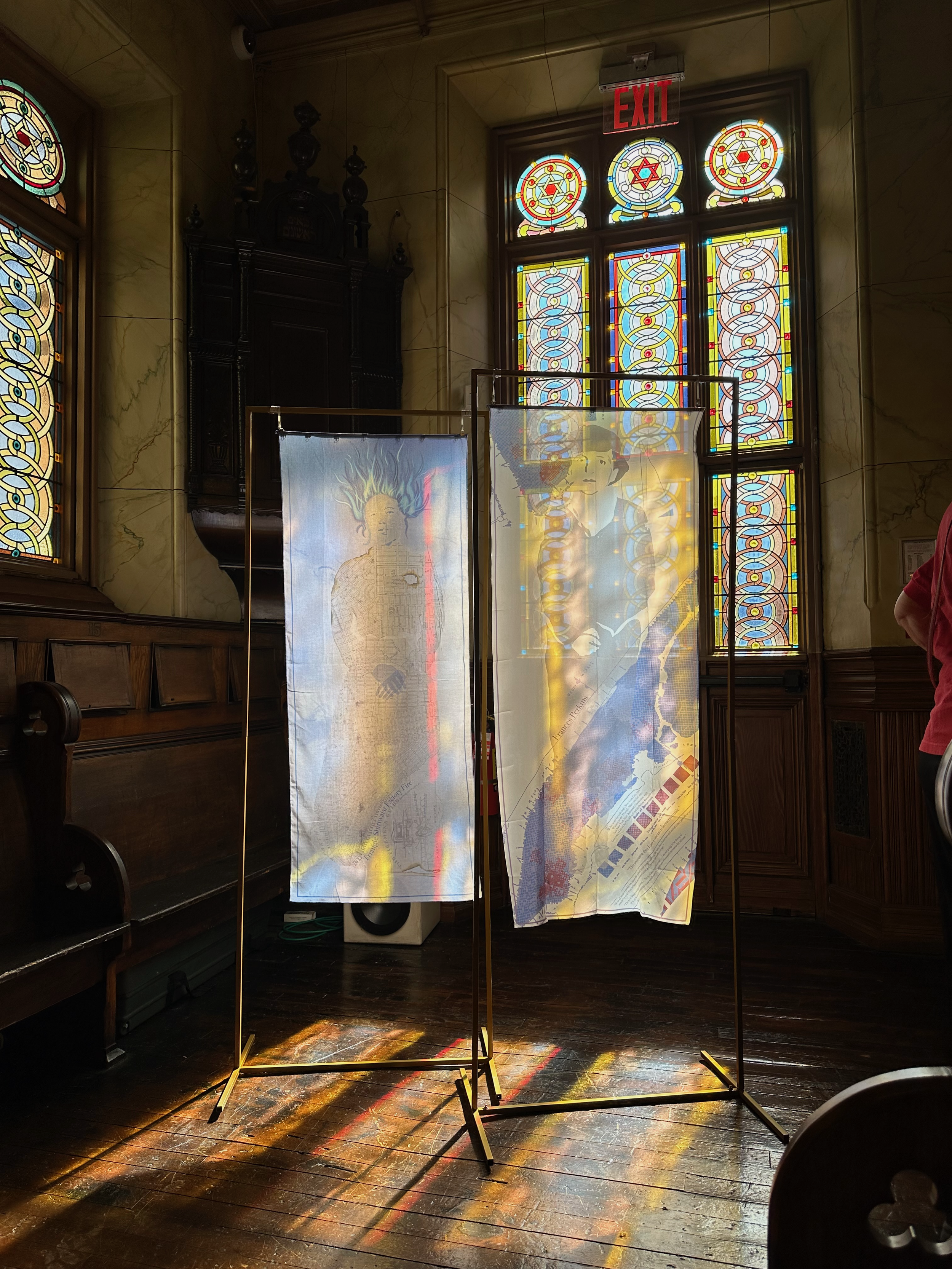 Art installation at the Museum at Eldridge street. Featuring two semi-transparent fabric panels, one of Frances Perkins, one of Dora Welfowitz who dies in the triangle shirt waist factory fire.
