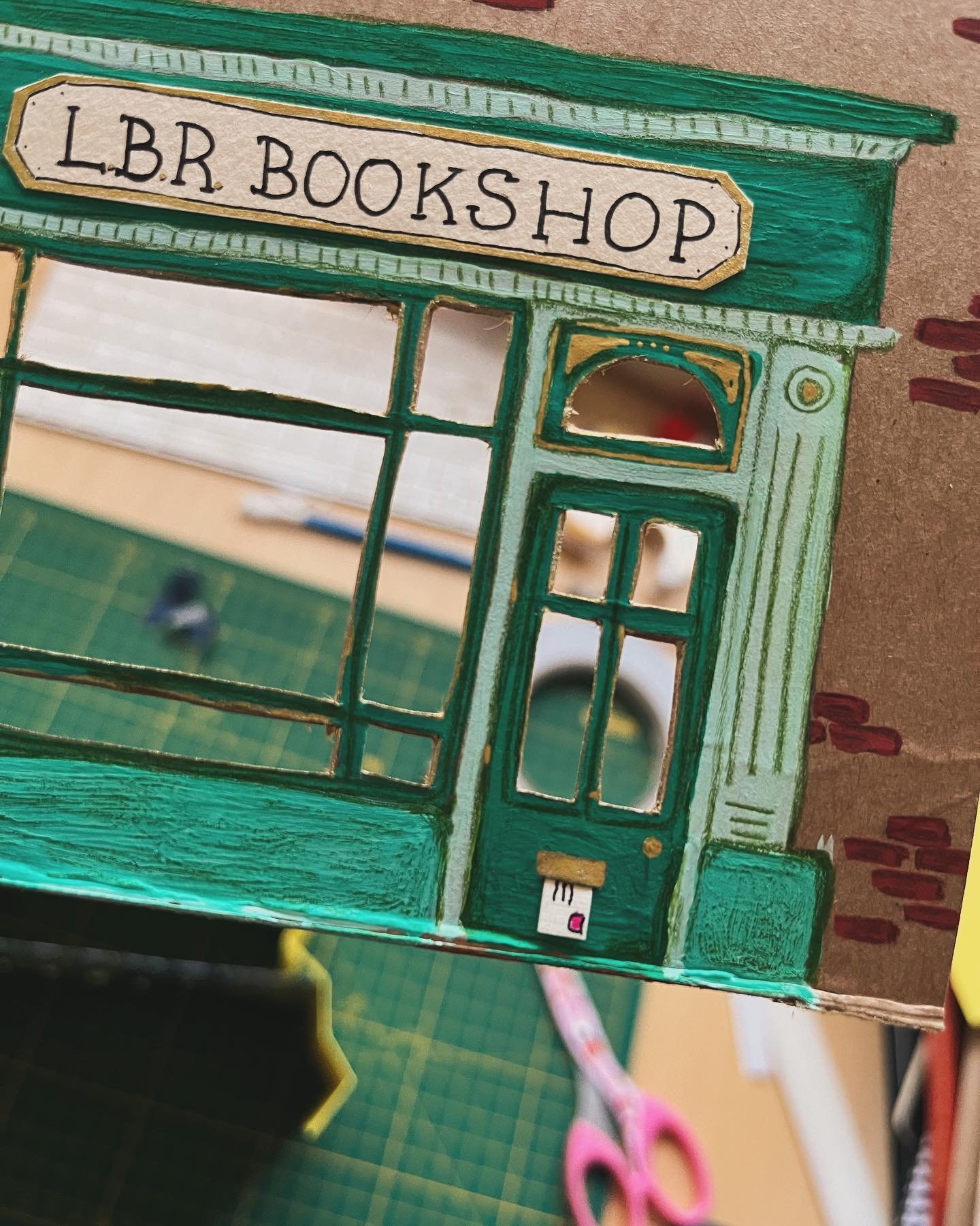 Sometimes you need to drop everything and learn how to make a tunnel book bookshop for a dear friend, @lbutetroch. Thank you @wildinksketch for the wonderful lesson and thank you to me for adding the tiniest letter to the mail slot at the last moment