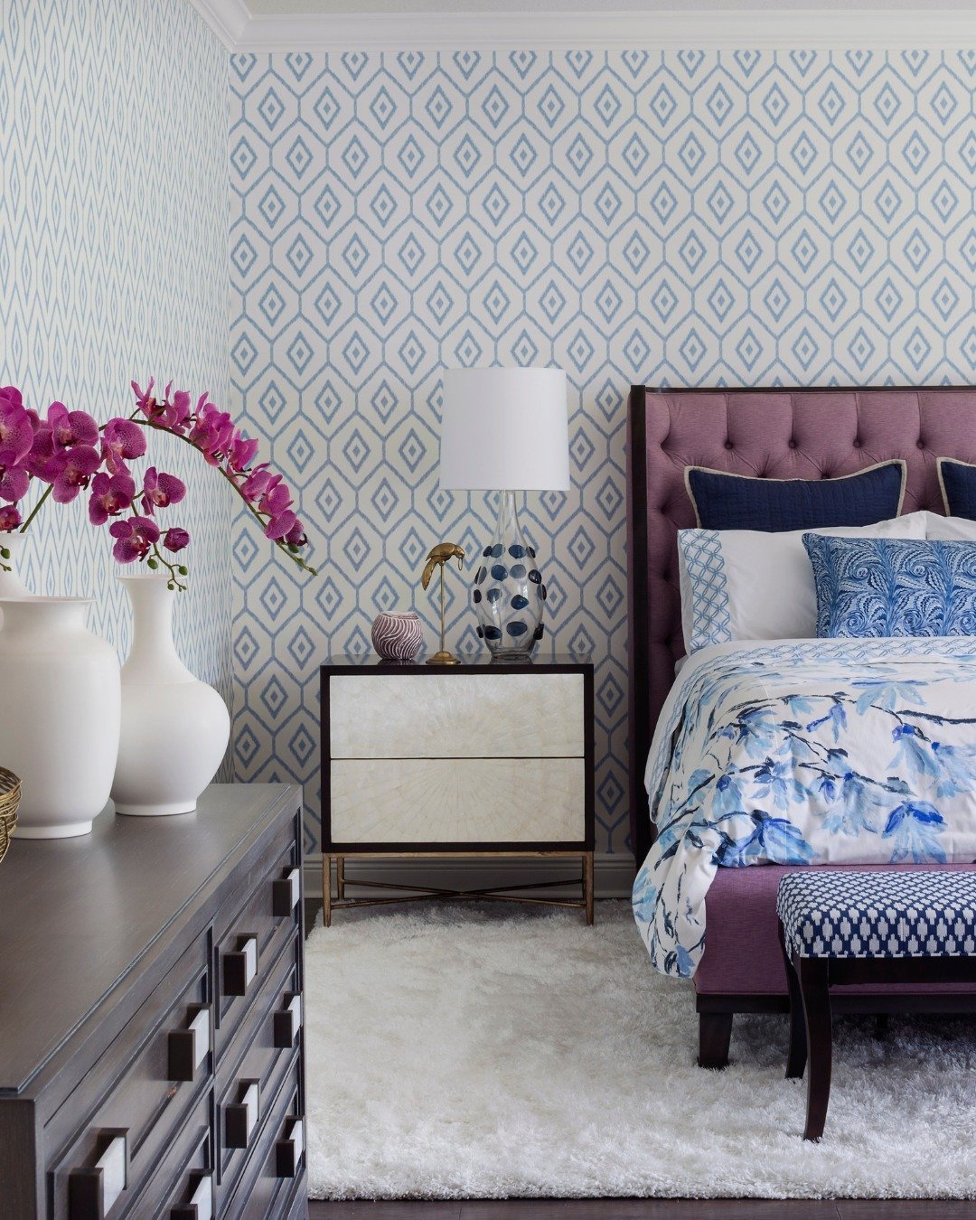 Pattern play in the very best way! 💙💜💙💜

With shades of blue to anchor the entire design and a kick of lavender for added personality, we crafted a space that's both chic and charming - perfect for unwinding in style.

Bring things up a notch in 