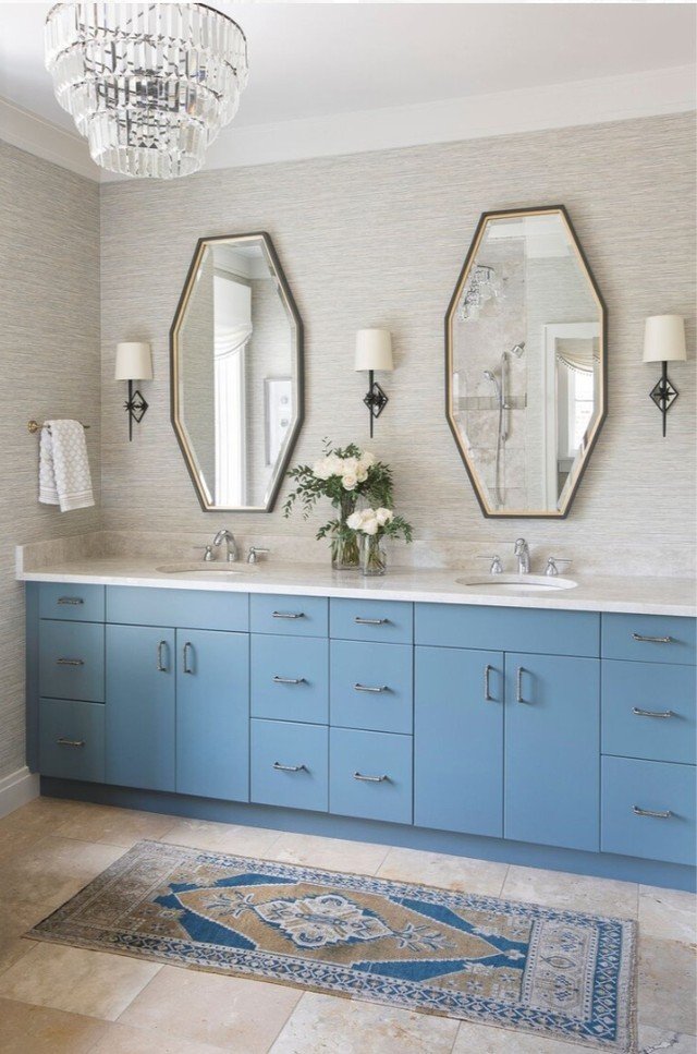 A little Before &amp; After - Bathroom Edition.  Tired travertine gets a glow-up!  New grasscloth wallpaper and Paint on existing cabinetry gave this once dated bathroom a whole new look 

Interior Design @lauraleehome
Photography:  @emredfield