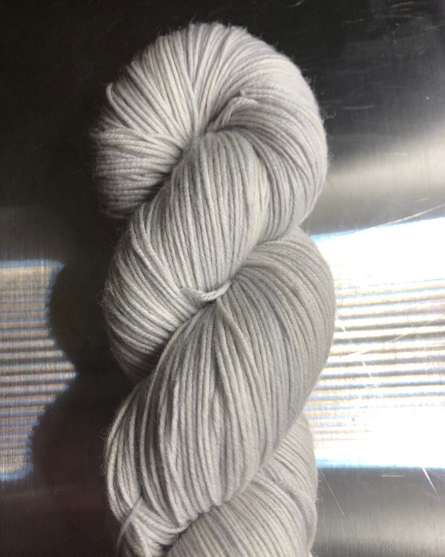 This photo reminds us of the industrious nature of our Sterling colourway! That&rsquo;s because it can pair so well for a colour work project or to provide contrast in a sock with different coloured toes and heels (try pairing it with one of our mini