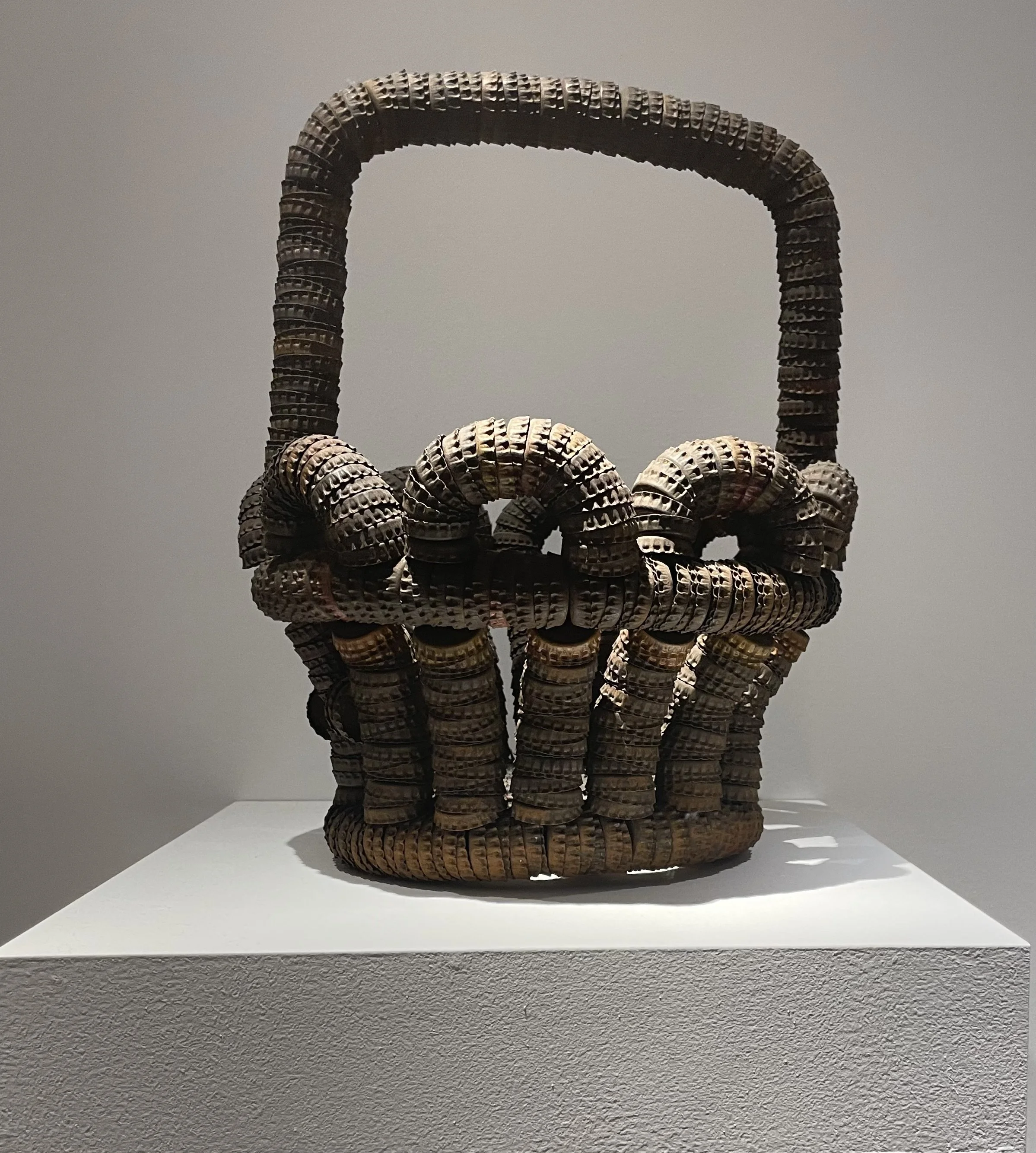 Unknown Artist, North Carolina, Bottle Cap Basket, ca. 1935. Metal bottle caps and wire.