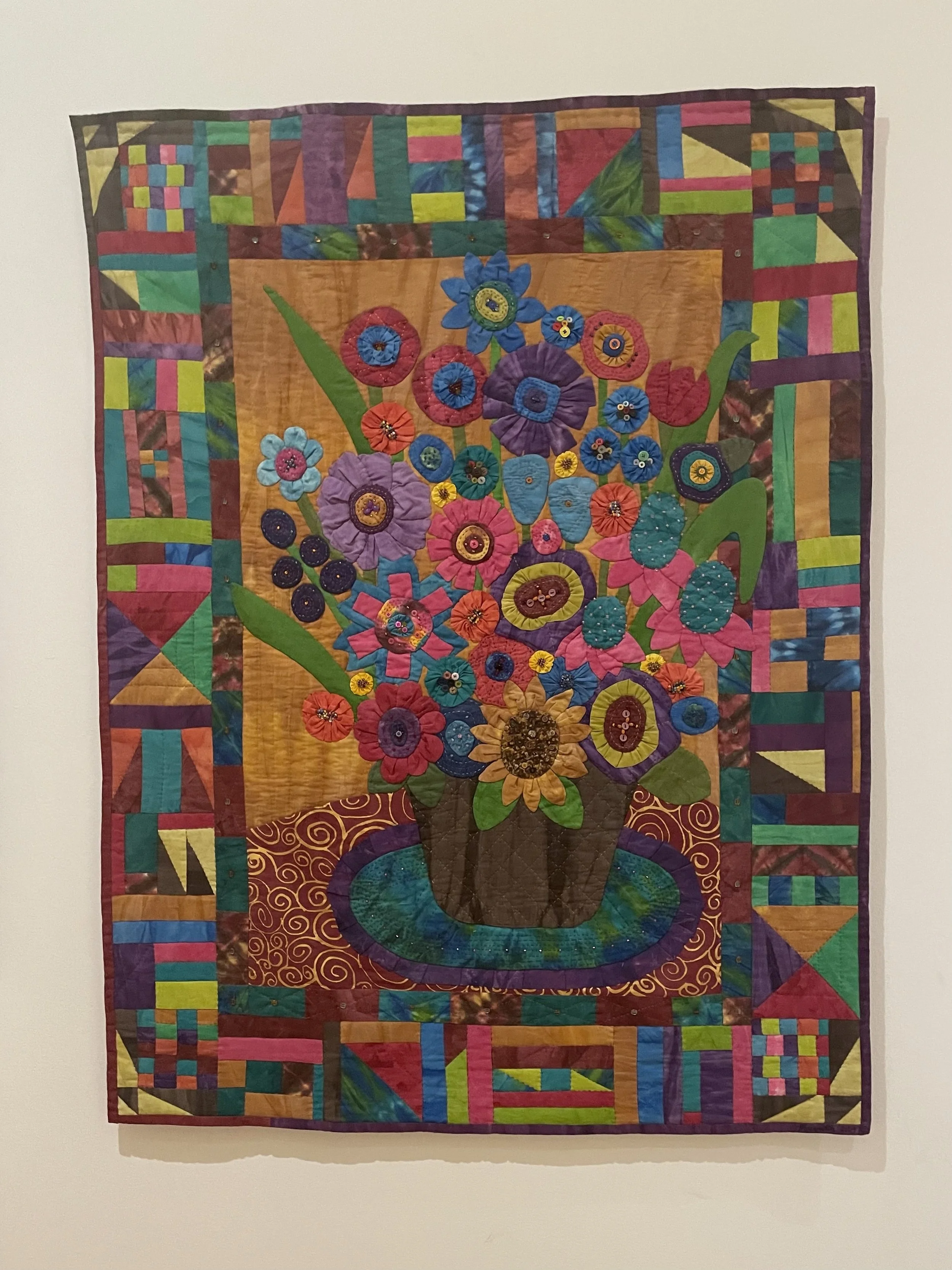 Marquetta Johnson. Hope Blossoms, 2009. Hand-dyed, hand-painted cotton fabric with buttons, and beads.