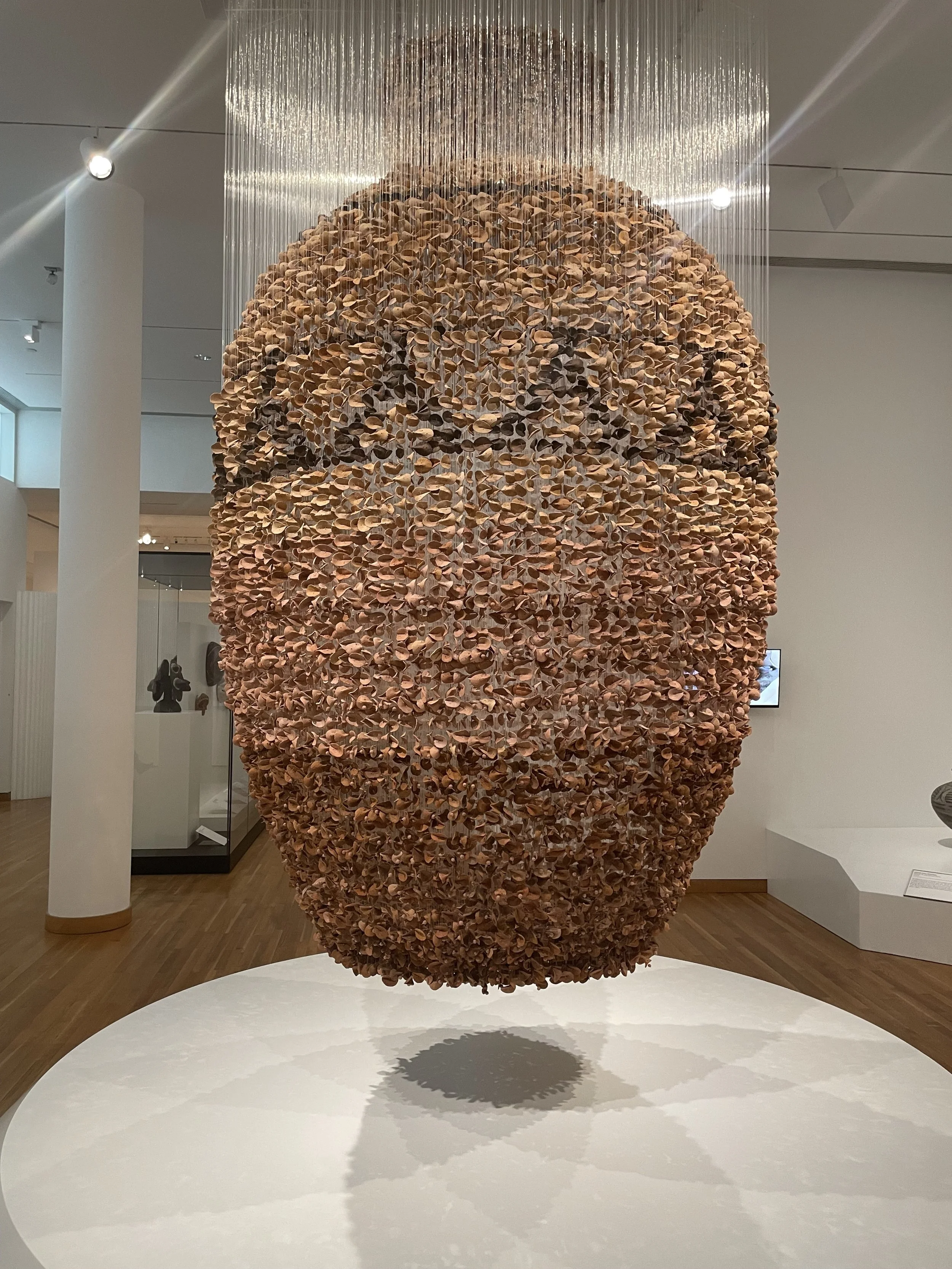 Ngozi-Omeje Ezema, Togetherness. 2022. Ceramics, acrylic, monofilament fishing line and metal.